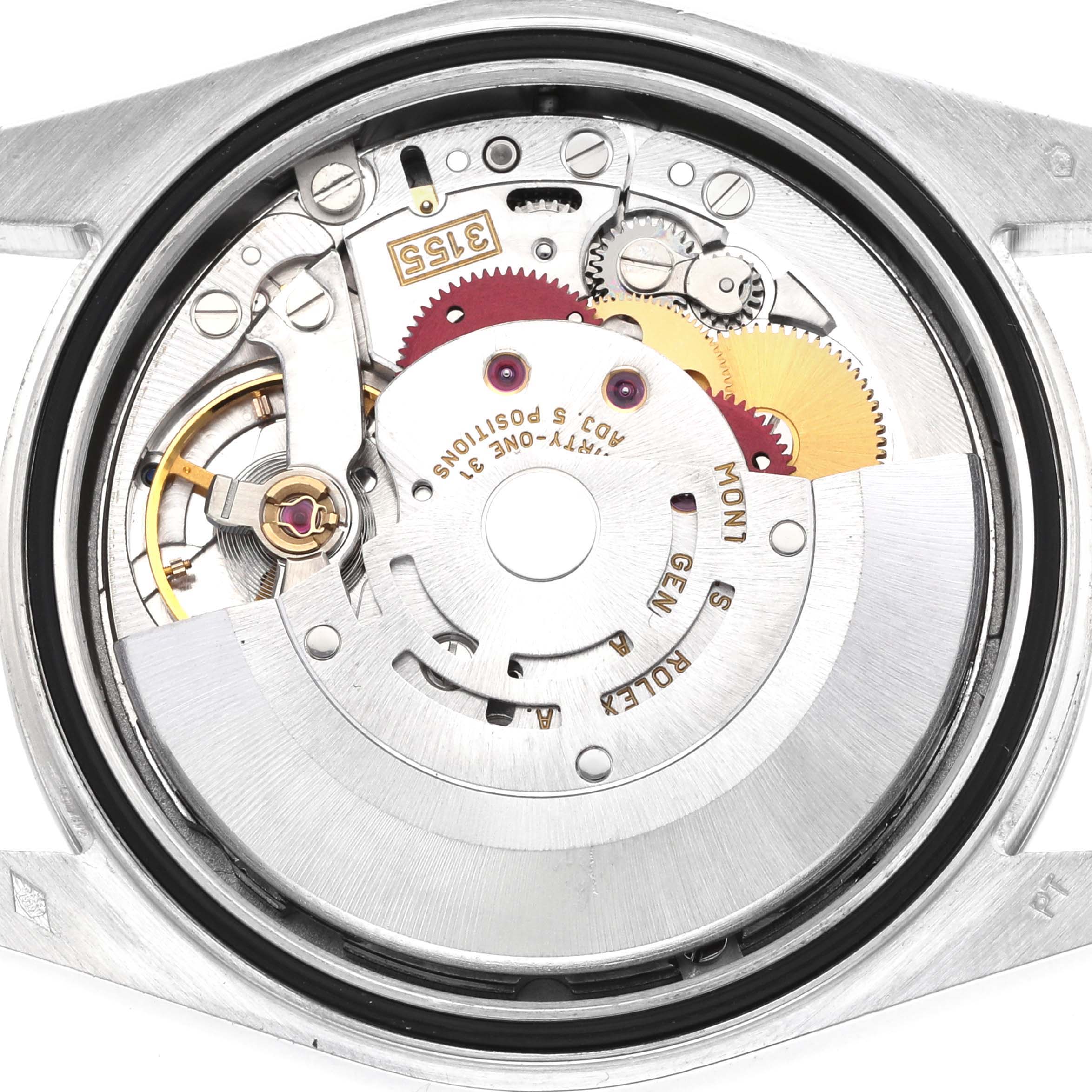 The image shows the movement of a Rolex President 118386 Men's Platinum Silver Dial watch from the back, highlighting its intricate mechanical parts.