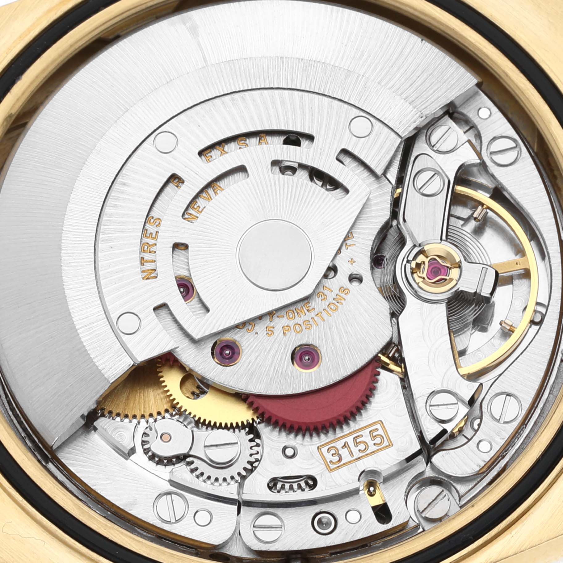 This image shows the intricate internal movement and components of a Rolex President 18238 Men's Yellow Gold Beige Dial 18238 Men's Yellow Gold Beige Dial model watch from a close-up angle.