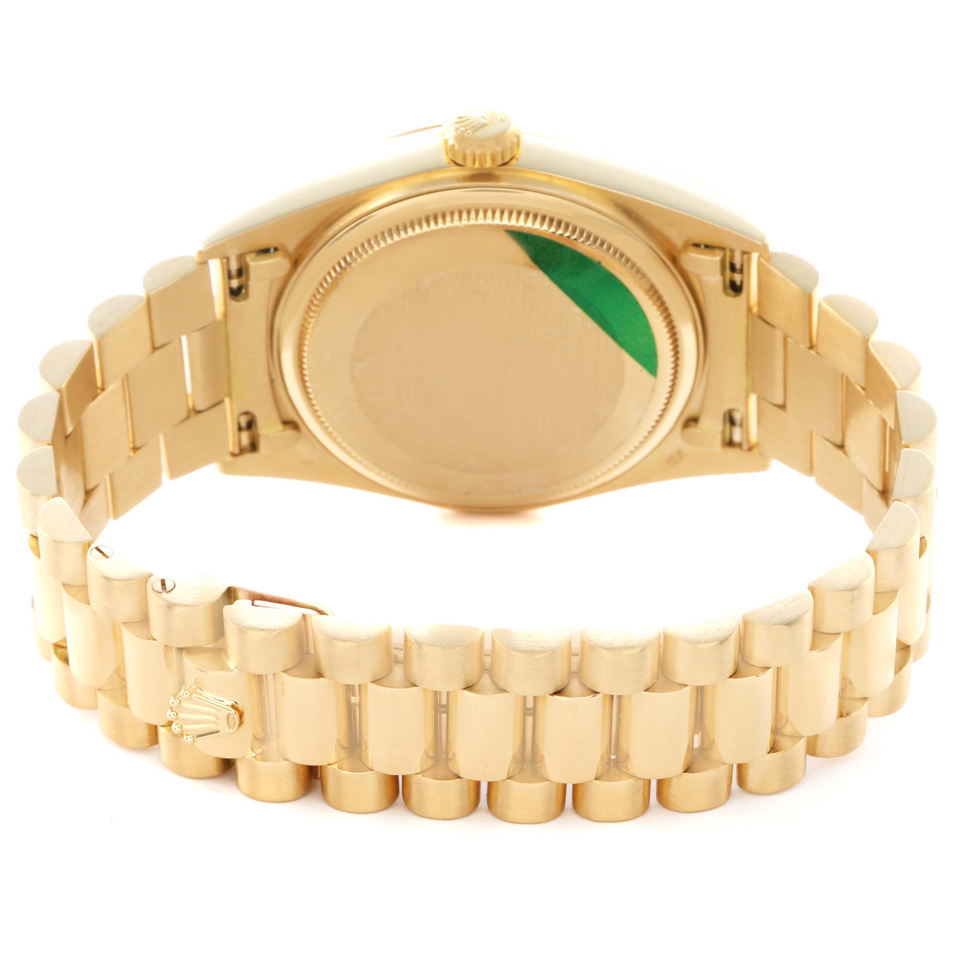 The image shows the back view of the Rolex President 18038 Men
s Yellow Gold Champagne Dial watch, highlighting the case back and bracelet.