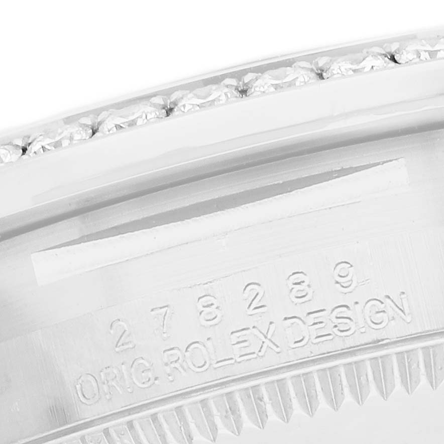 The image shows a close-up of the bezel and engraving on the case of a Rolex President 278288 Women's White Gold Mother of Pearl Dial model.