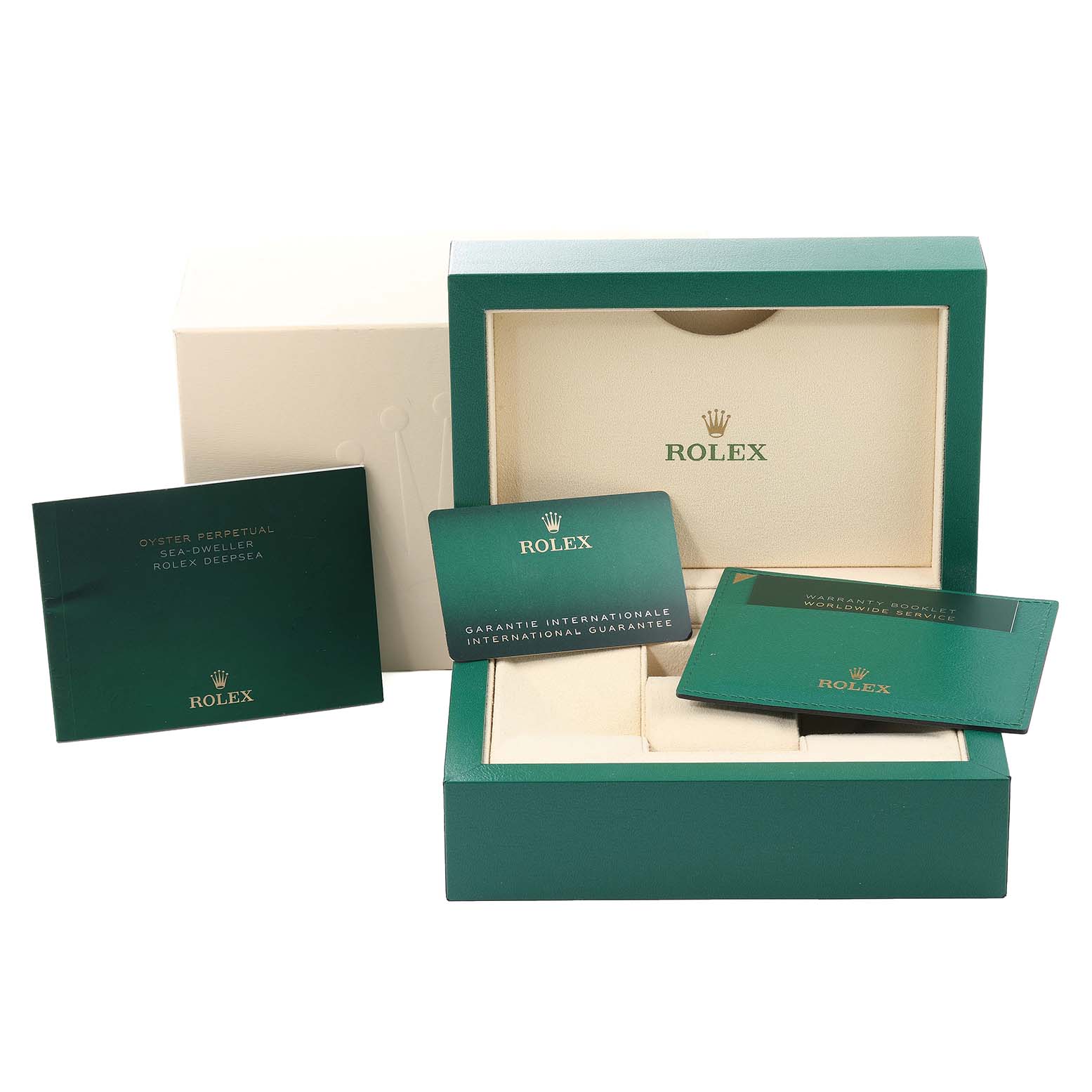 The image shows the packaging, manuals, and warranty cards for a Rolex Sea-Dweller 126603 Men
s Steel and Gold (two tone) Black Dial 126603 Men
s Steel and Gold (two tone) Black Dial watch.