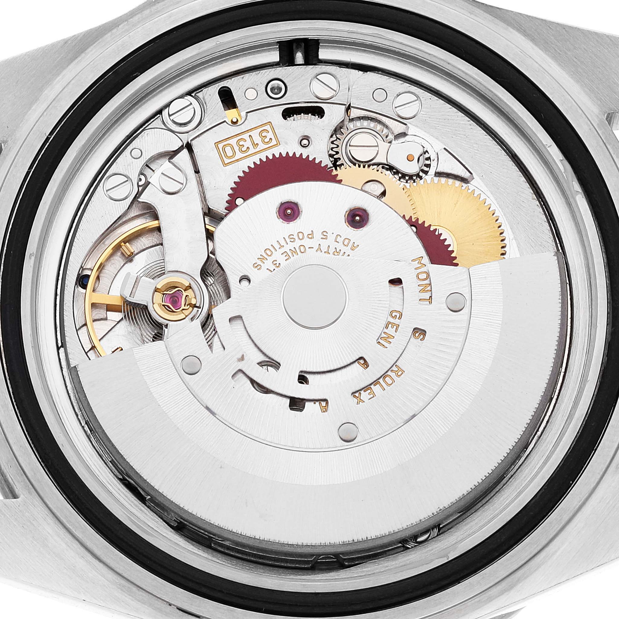 This image shows a close-up view of the movement inside a Rolex Submariner 14060 Men
s Stainless Steel Black Dial 14060 Men
s Stainless Steel Black Dial watch, focusing on its intricate mechanical components.