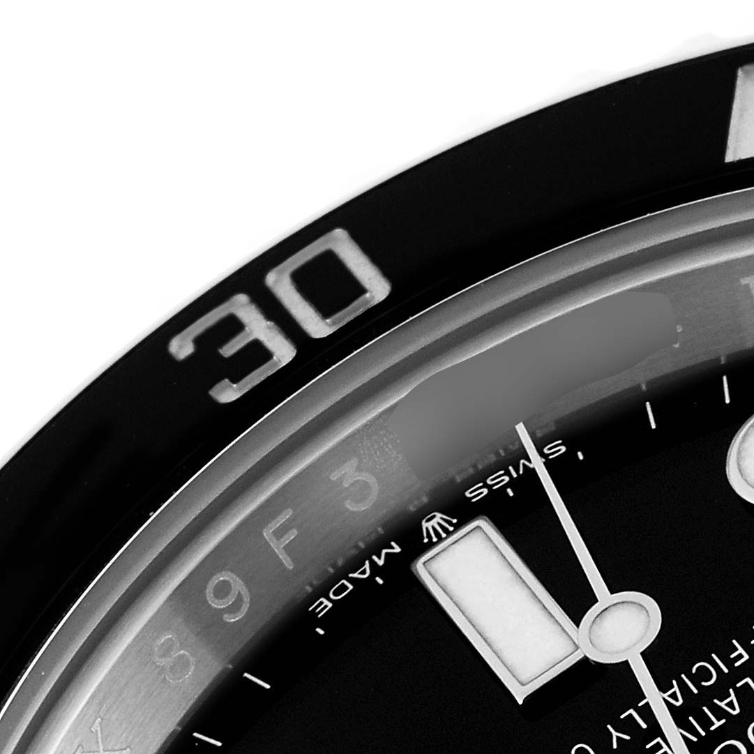 The image shows a close-up of the bezel and dial of a Rolex Submariner 126610 Men
s Stainless Steel Black Dial 126610 Men
s Stainless Steel Black Dial watch, focusing on the 30-minute mark.
