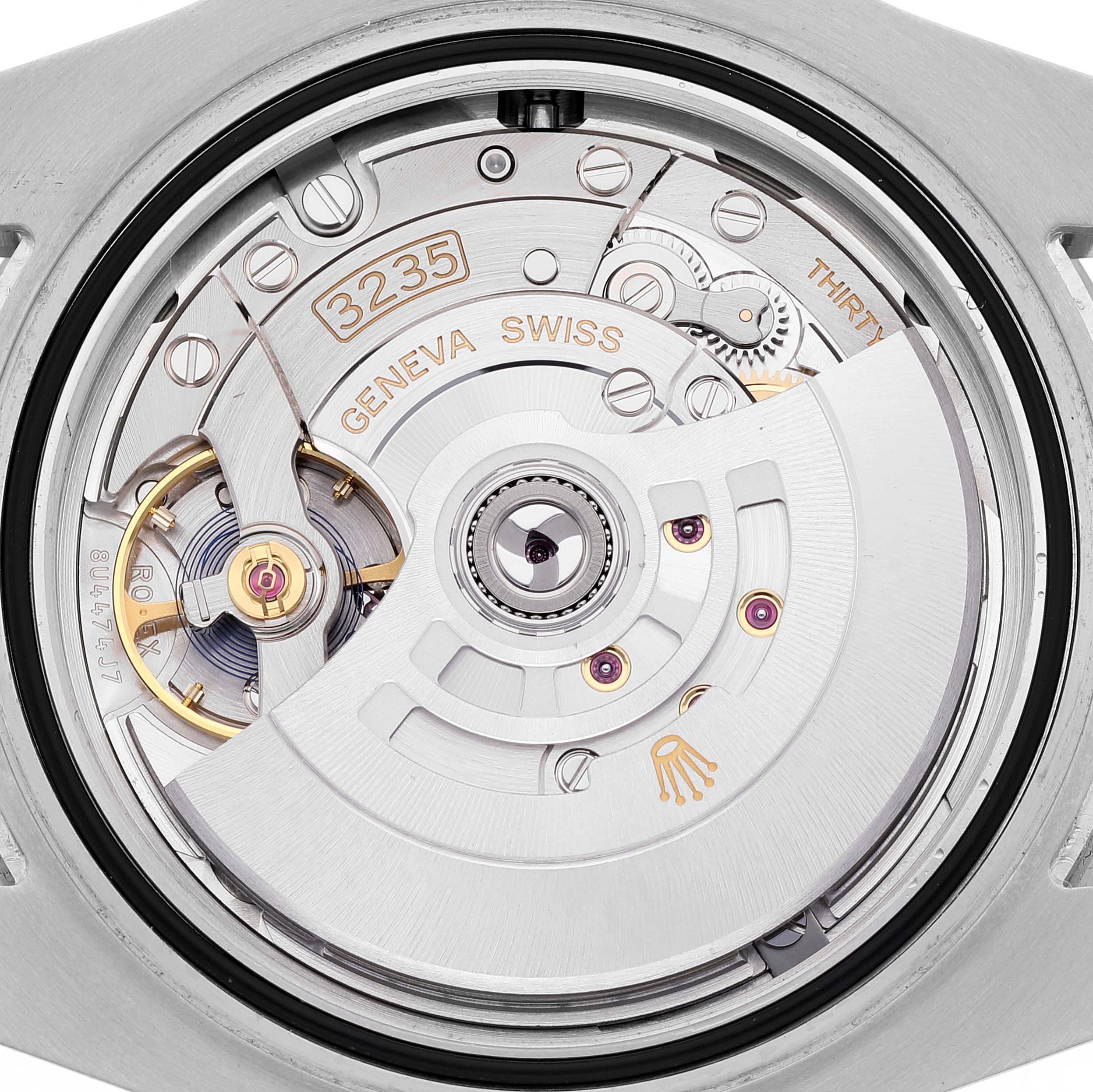 This image shows the internal movement mechanism of a Rolex Submariner 126610 Men
s Stainless Steel Black Dial 126610 Men
s Stainless Steel Black Dial watch model 3235, viewed from the back.