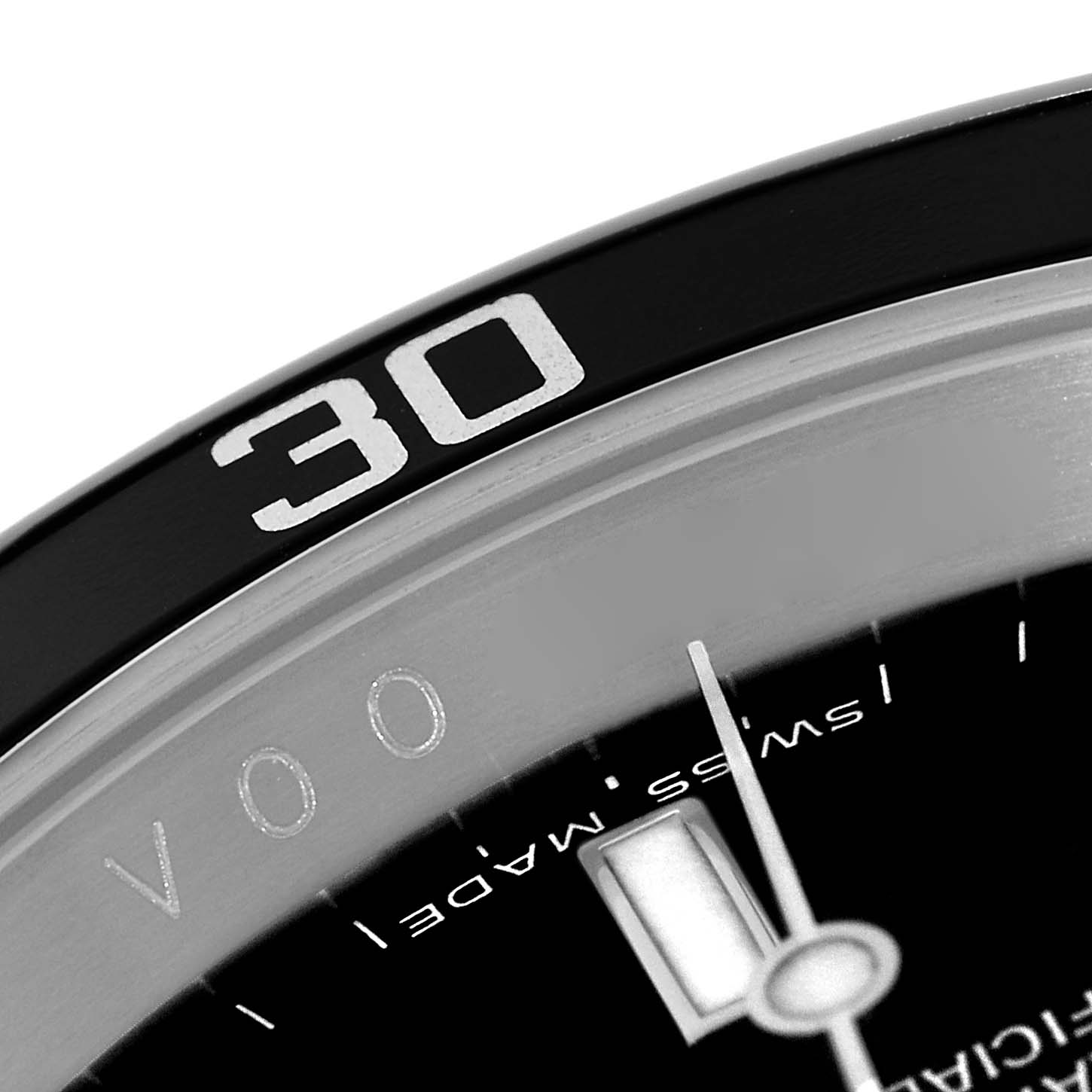 The image shows a close-up angle of the bezel and part of the dial of a Rolex Submariner 16610 Men
s Stainless Steel Black Dial 16610 Men
s Stainless Steel Black Dial watch with the "30" minute marker visible.