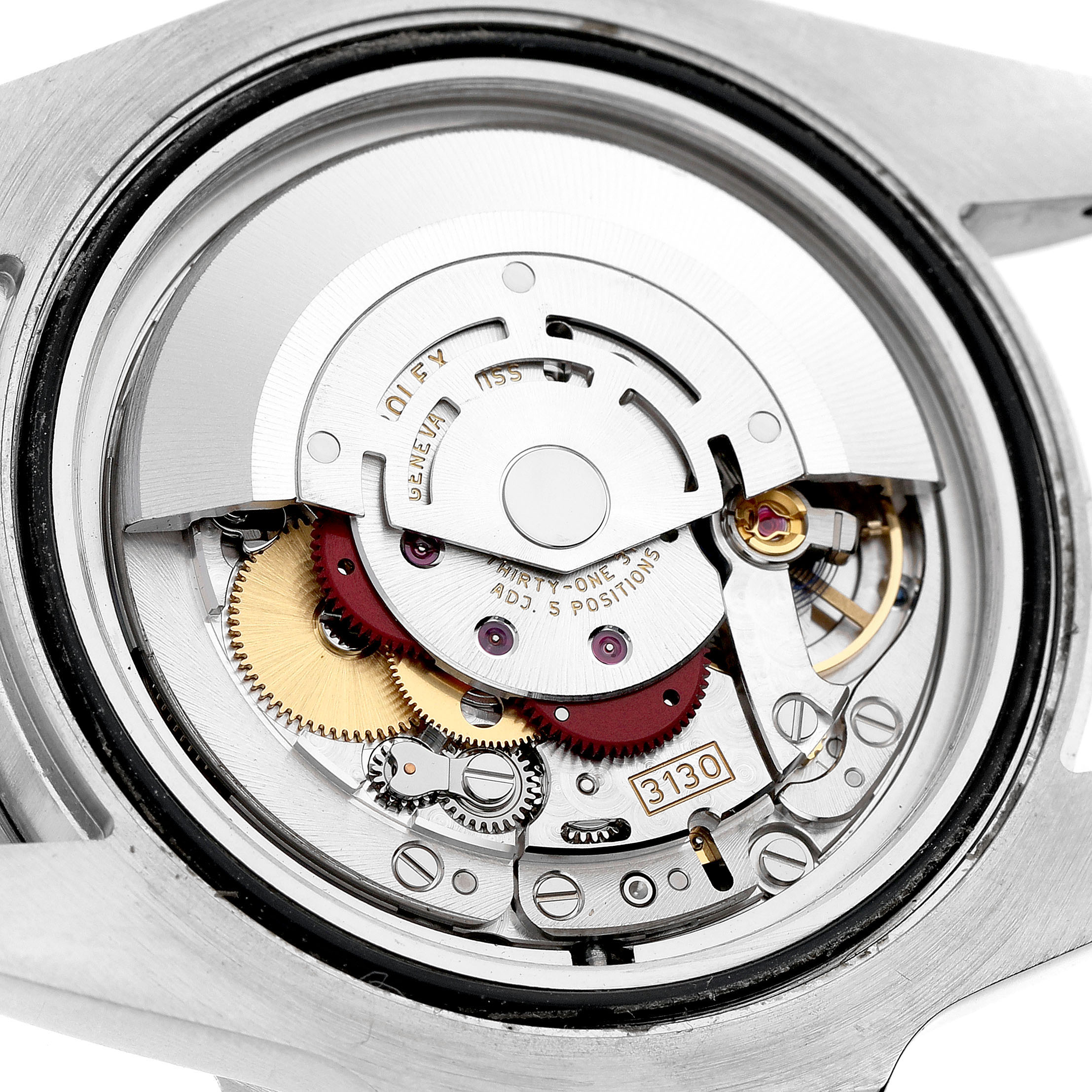 The image shows the movement of a Rolex Submariner 114060 Men's Stainless Steel Black Dial, focusing on its intricate gears and mechanical parts from the back.