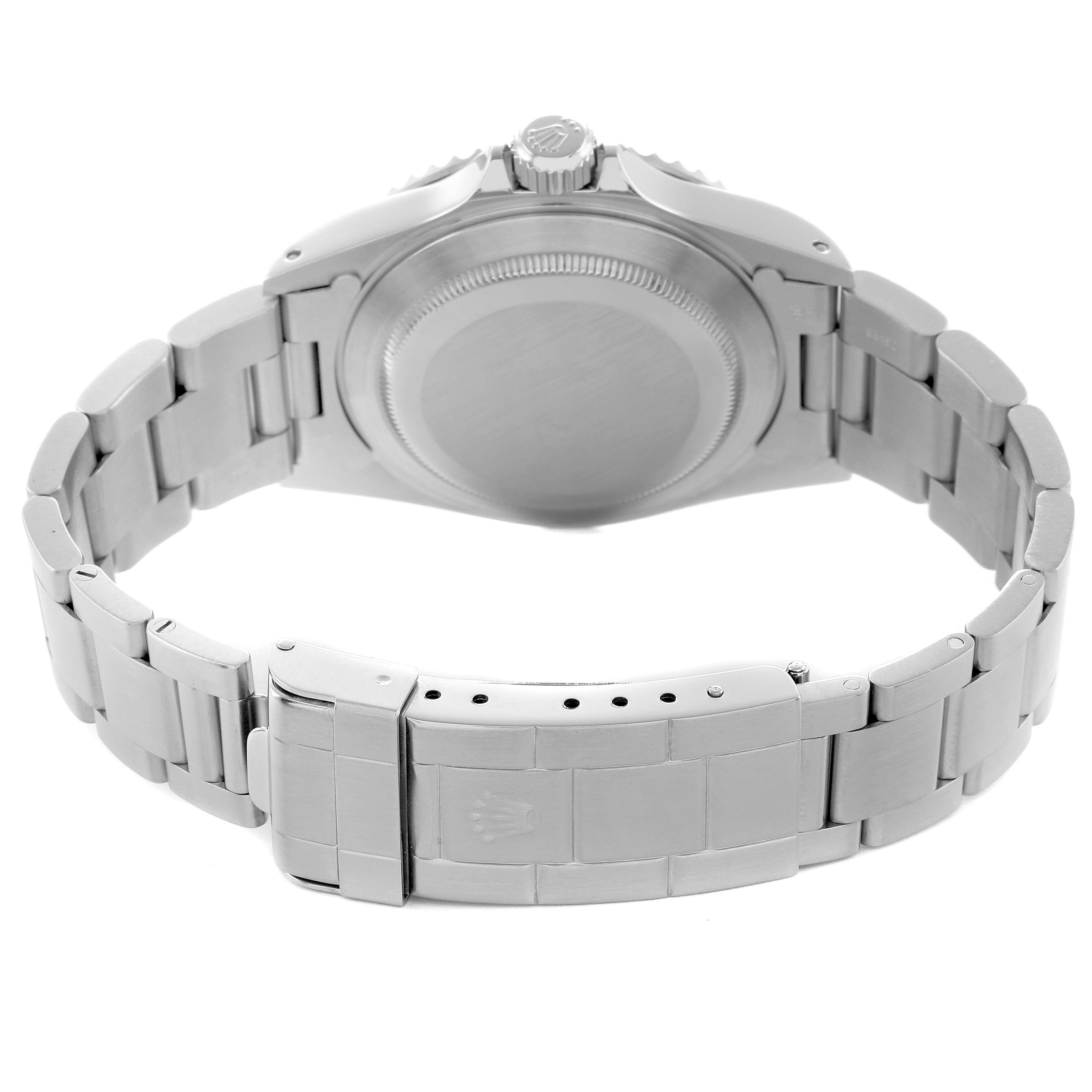 The image shows the back view of the Rolex Submariner 14060 Men
s Stainless Steel Black Dial, highlighting its bracelet and clasp.