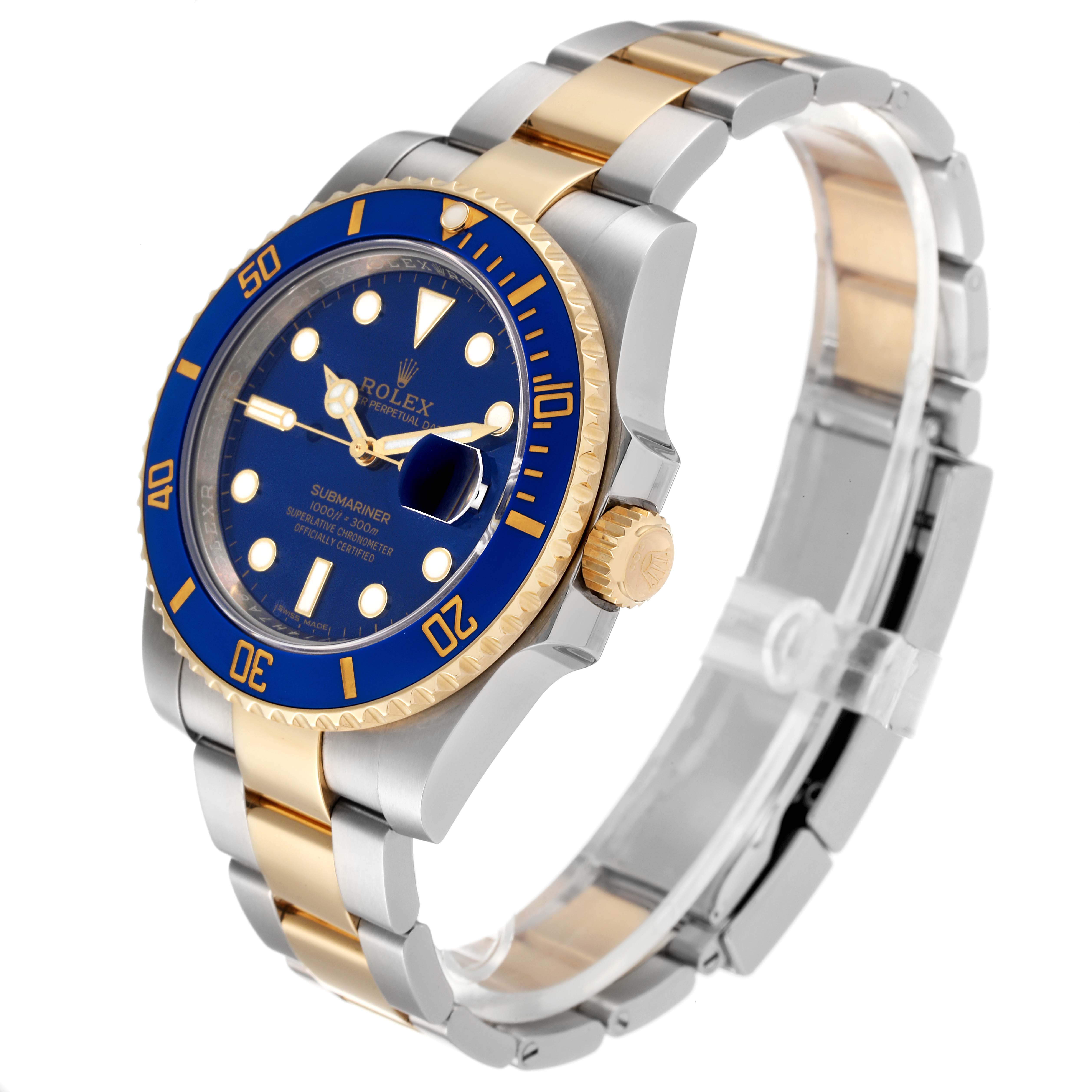 This image shows a Rolex Submariner 116613 Men's Steel and Gold (two tone) Blue Dial 116613 Men's Steel and Gold (two tone) Blue Dial watch from an angled side view, highlighting its blue dial, bezel, and two-tone bracelet.