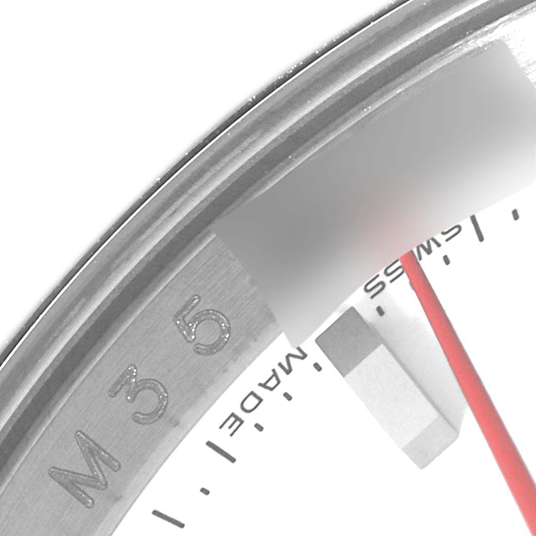The image shows a close-up, angled shot of the bezel, case, and part of the dial of a Rolex Turn-o-Graph 116264 Men
s Stainless Steel White Dial 116264 Men
s Stainless Steel White Dial watch.