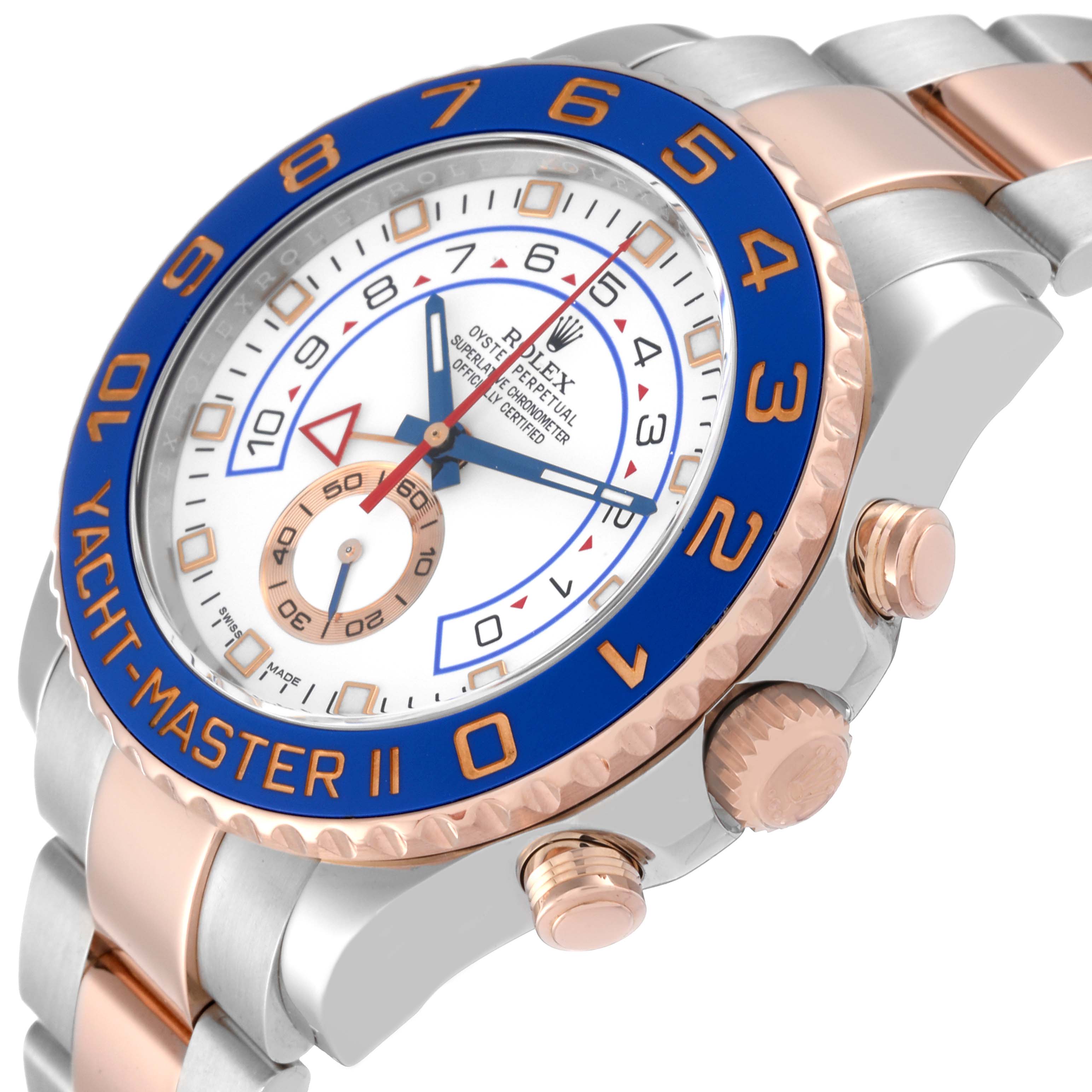 This Rolex Yacht-Master 116681 Men
s Steel and Gold (two tone) White Dial 116681 Men
s Steel and Gold (two tone) White Dial II watch is shown at an oblique angle, highlighting the bezel, crown, and part of the bracelet.