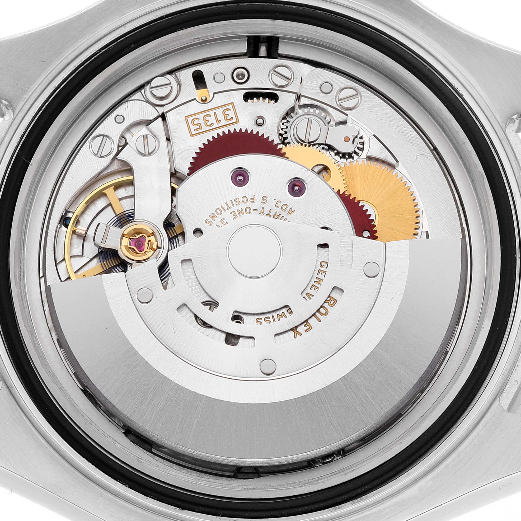 The image shows an angled close-up of the movement mechanism of a Rolex Yacht-Master 116622 Men
s Stainless Steel Grey Dial 116622 Men
s Stainless Steel Grey Dial watch.