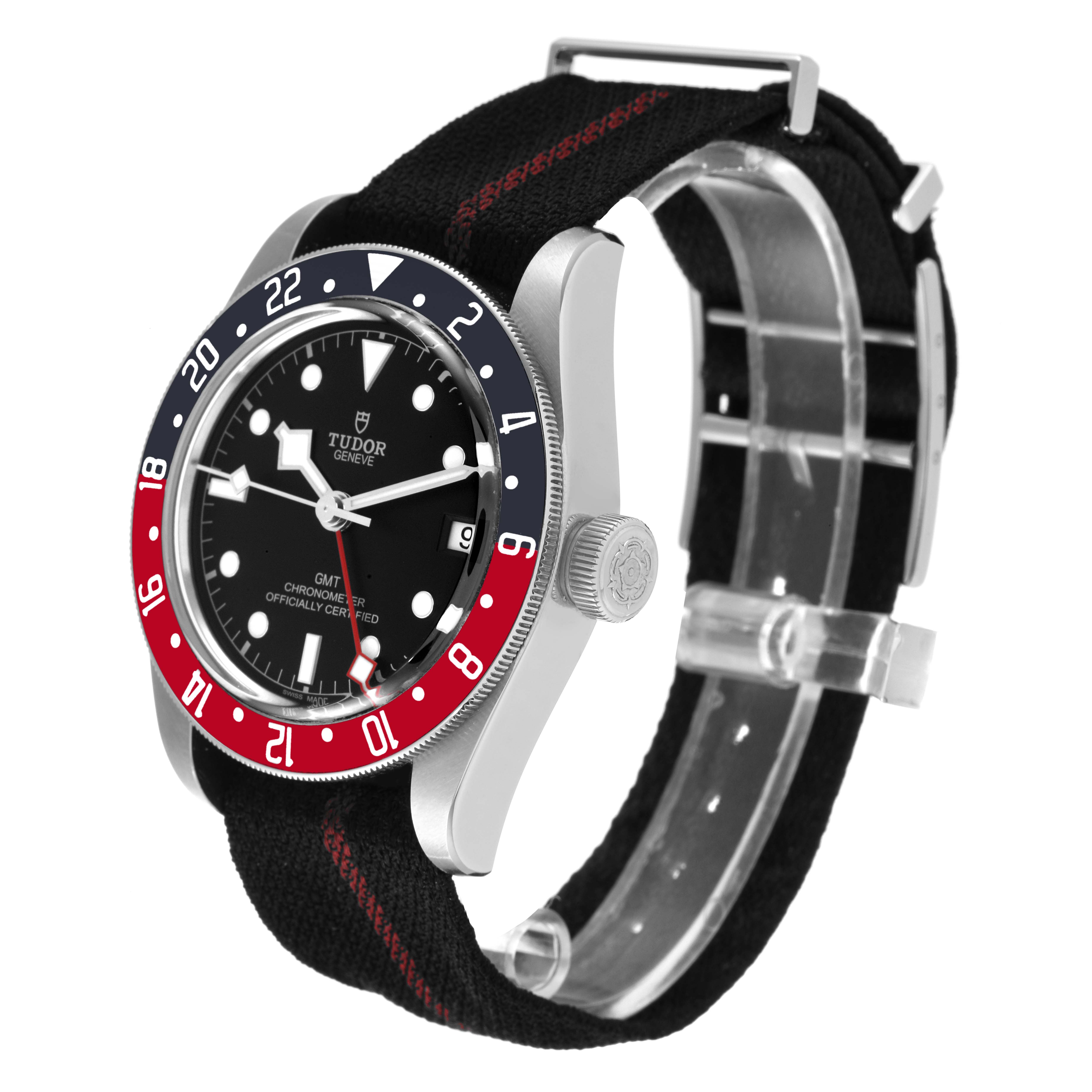 The image shows a Tudor Heritage Black Bay 79830RB Men's Stainless Steel Black Dial 79830RB Men's Stainless Steel Black Dial watch at a slight angle, featuring the face, bezel, and fabric strap.