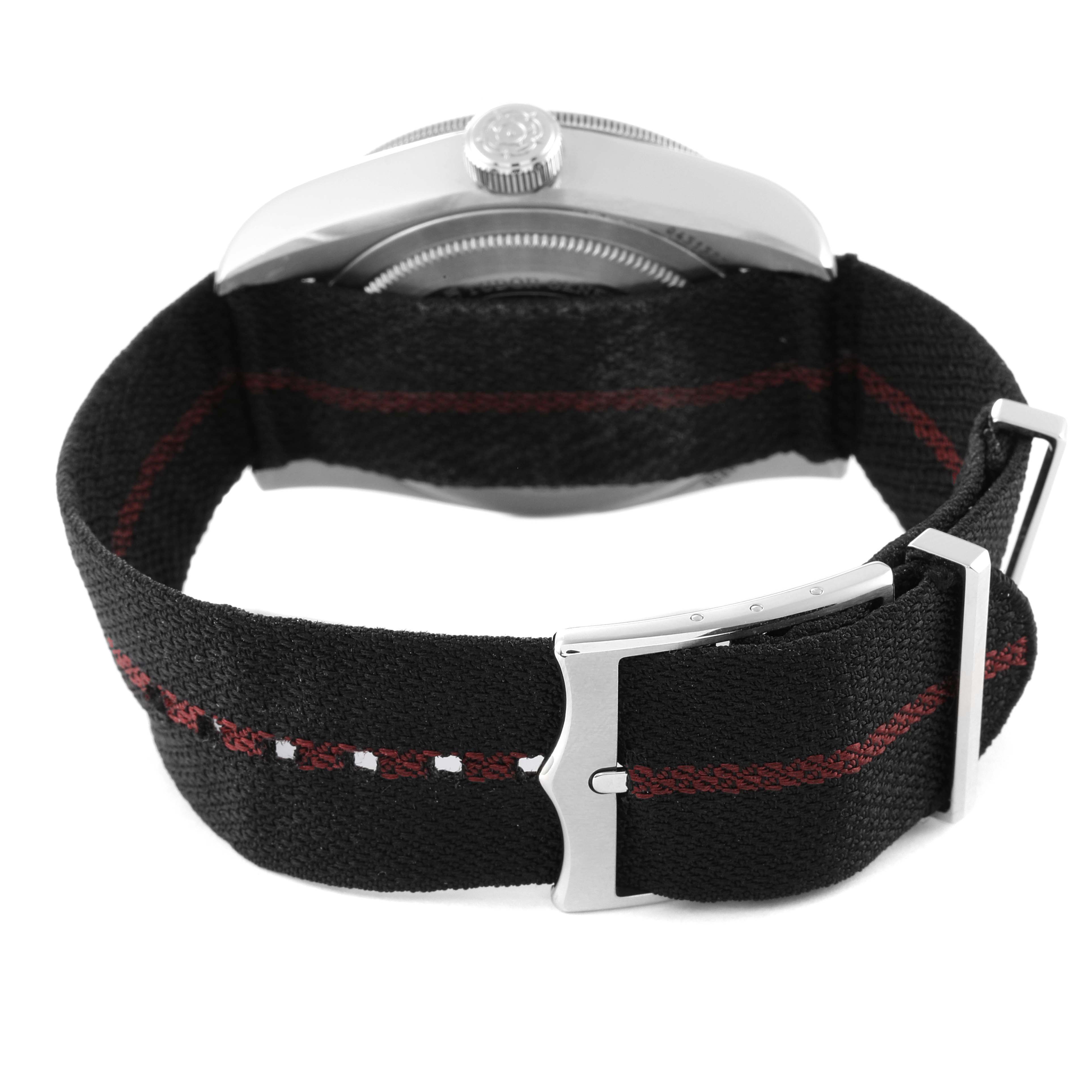 The image shows the side view of a Tudor Heritage Black Bay 79830RB Men's Stainless Steel Black Dial 79830RB Men's Stainless Steel Black Dial watch focusing on the strap and buckle.