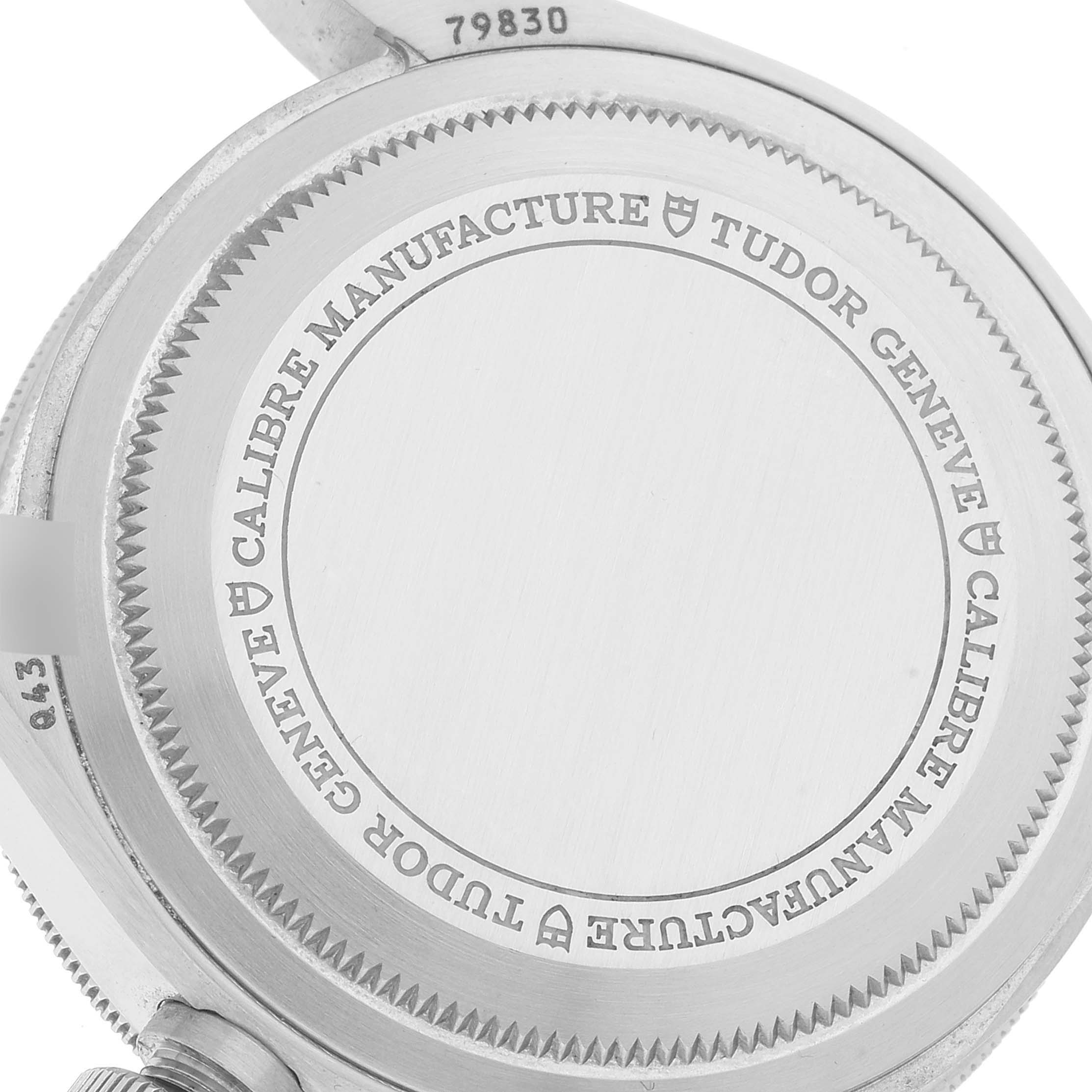 The image shows the back case of a Tudor Heritage Black Bay 79830RB Men's Stainless Steel Black Dial 79830RB Men's Stainless Steel Black Dial watch, with the caliber manufacture markings visible.