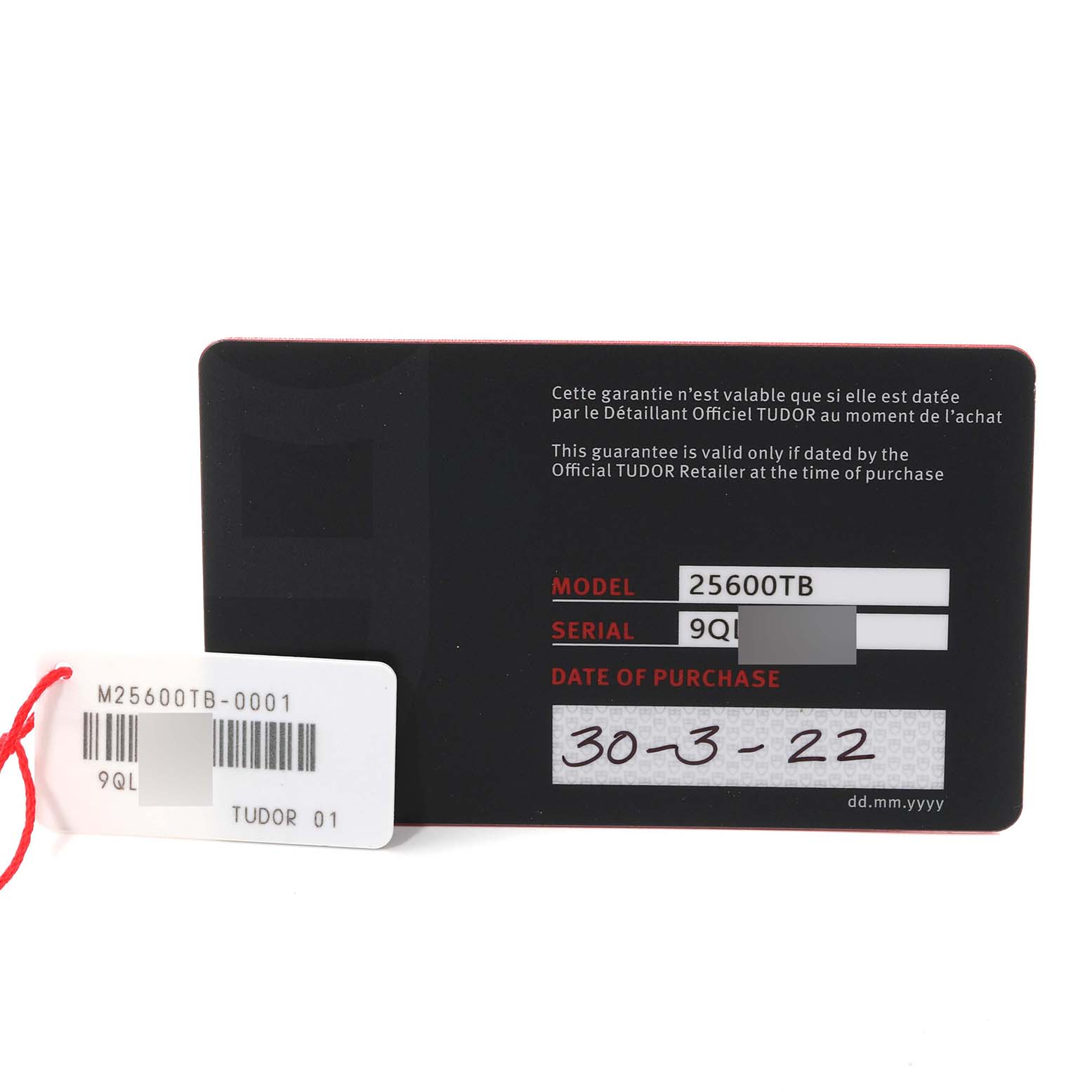 The image shows the warranty card and tag for the Tudor Pelagos 25600TB Men's Titanium Blue Dial 25600TB Men's Titanium Blue Dial watch model 25600TB, along with purchase information.