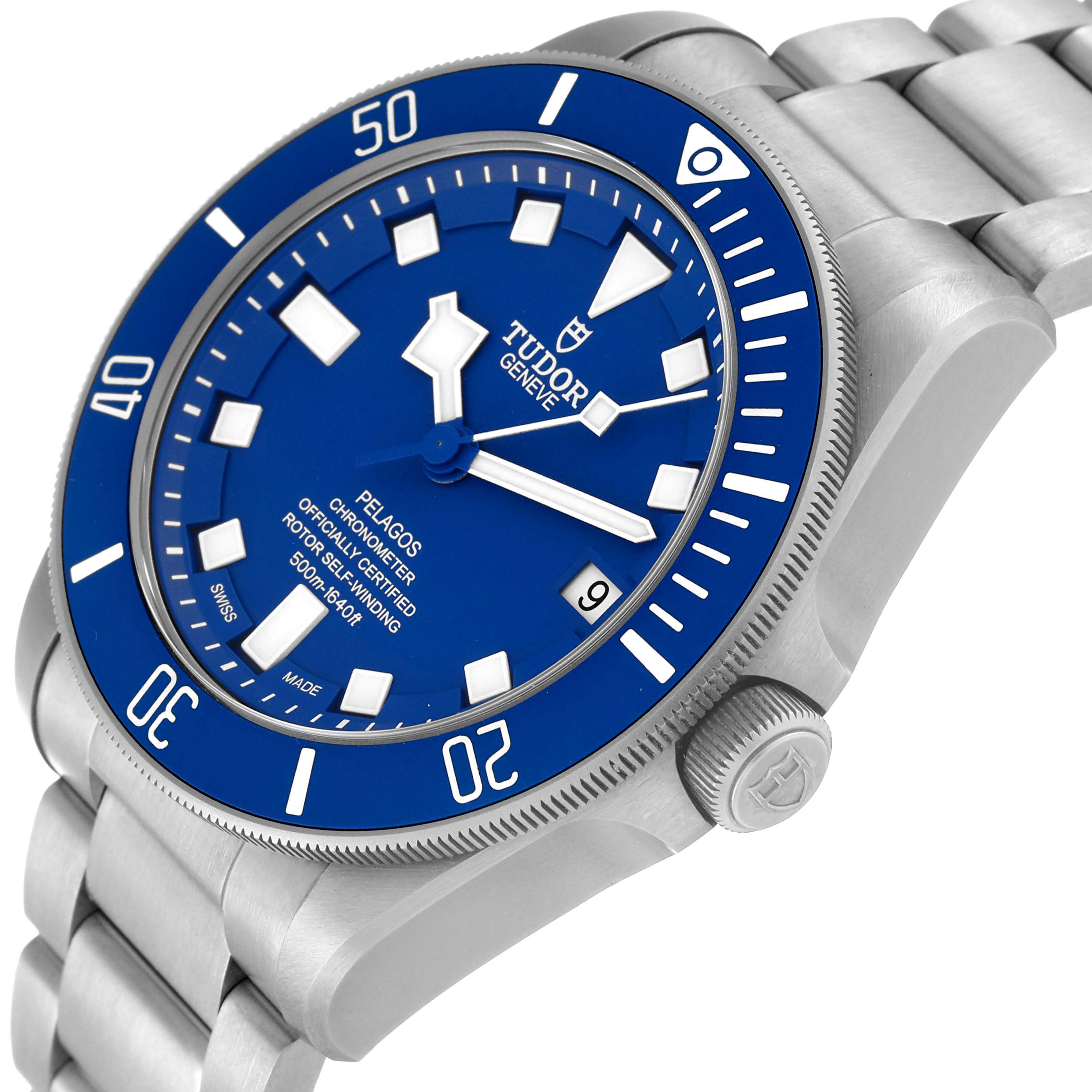 The image shows a side angled view of the Pelagos Tudor watch, focusing on the blue dial, bezel, and steel bracelet.