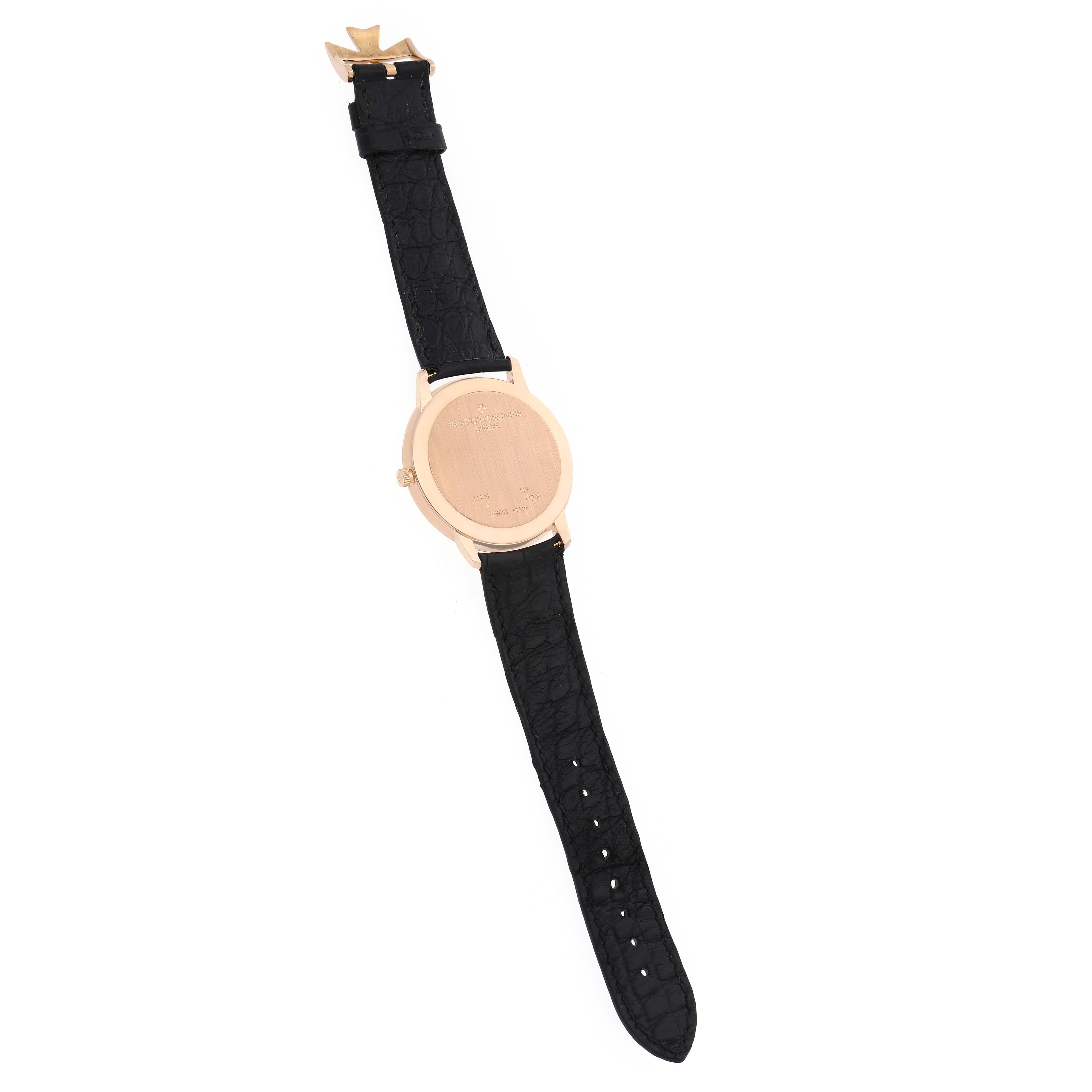 The Vacheron Constantin Patrimony 81180/000R-9159 Men
s Rose Gold Silver Dial watch is shown from the back, highlighting the case back, strap, and buckle.