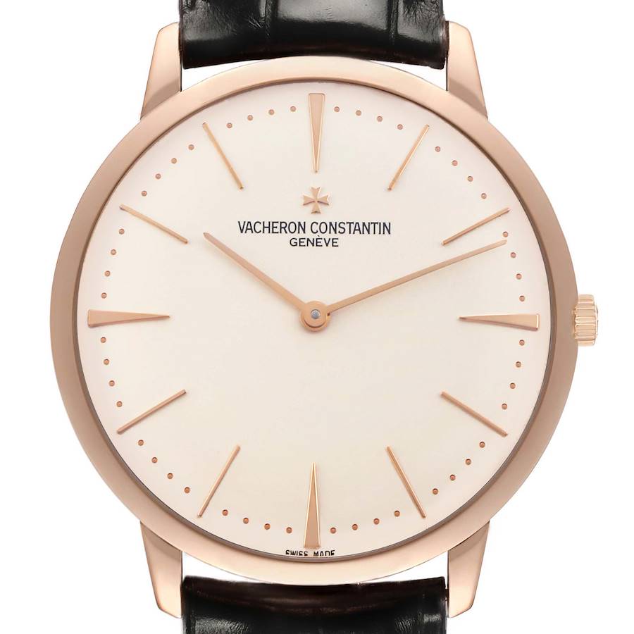 The Vacheron Constantin Patrimony 81180/000R-9159 Men's Rose Gold Silver Dial watch is shown from a front angle, highlighting the dial, hands, and crown, with a leather strap visible.