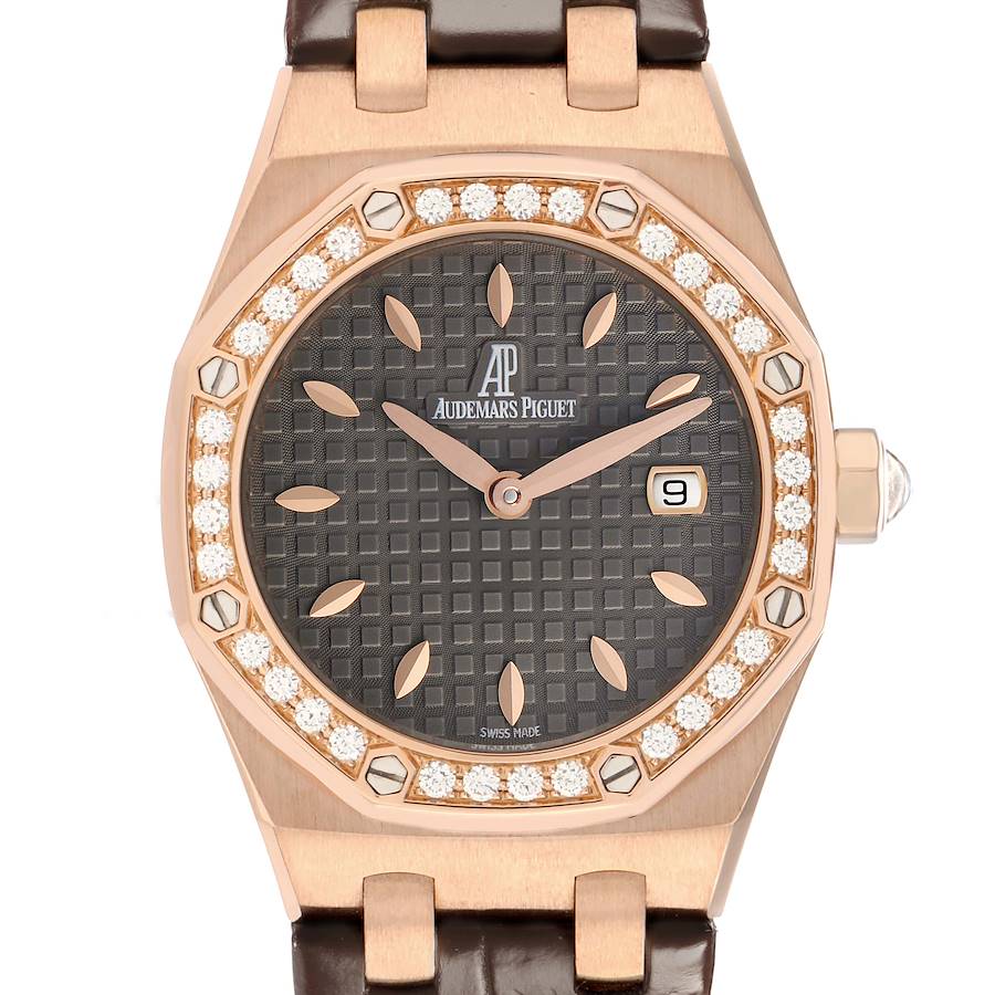 The Audemars Piguet Royal Oak 67621OR Women's Rose Gold Grey Dial watch is shown from the front, displaying its octagonal bezel, textured dial, and leather strap.