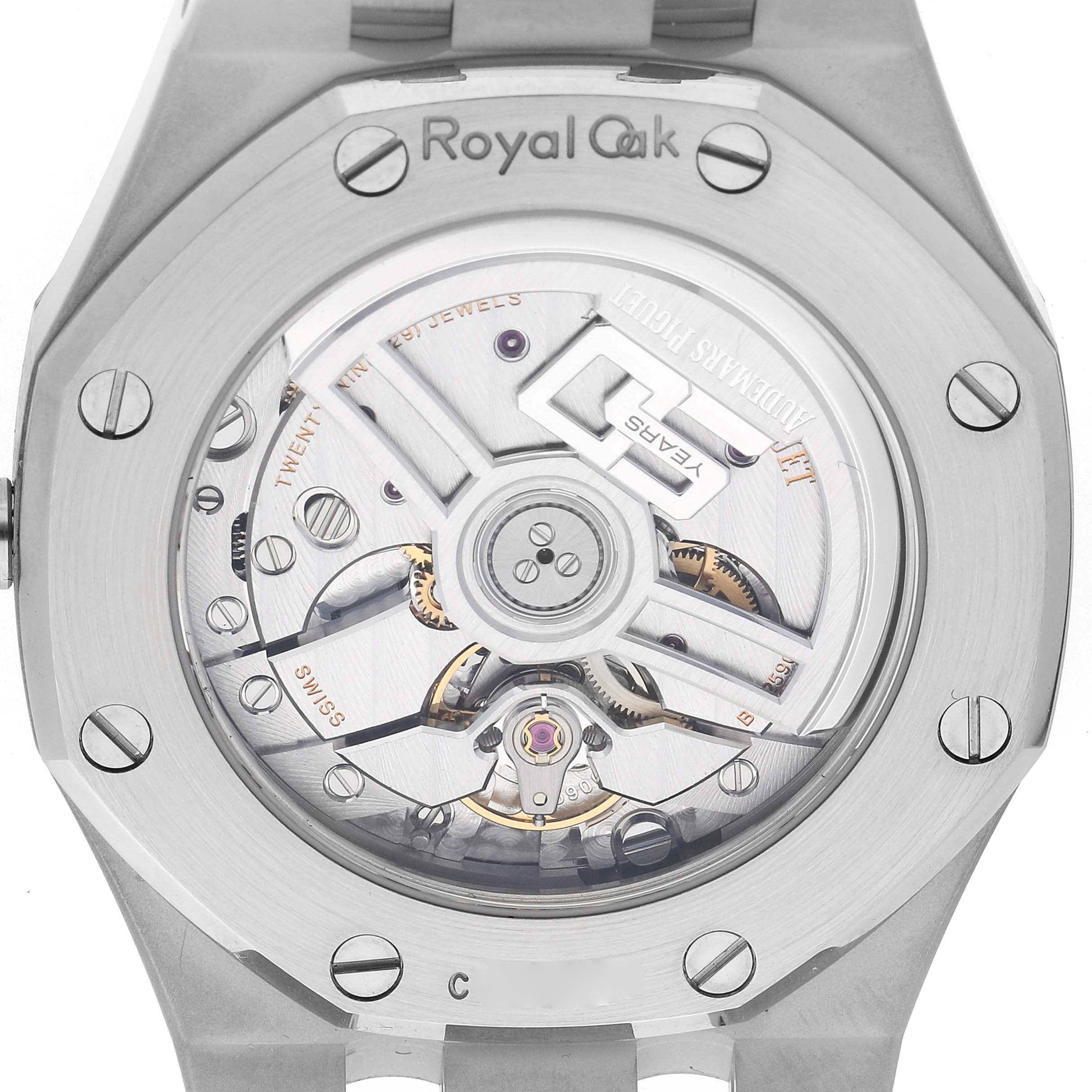 The image shows the back of an Audemars Piguet Royal Oak 77450ST.OO.1361ST.01 Men's Stainless Steel Silver Dial, highlighting its open case back and mechanical movement.
