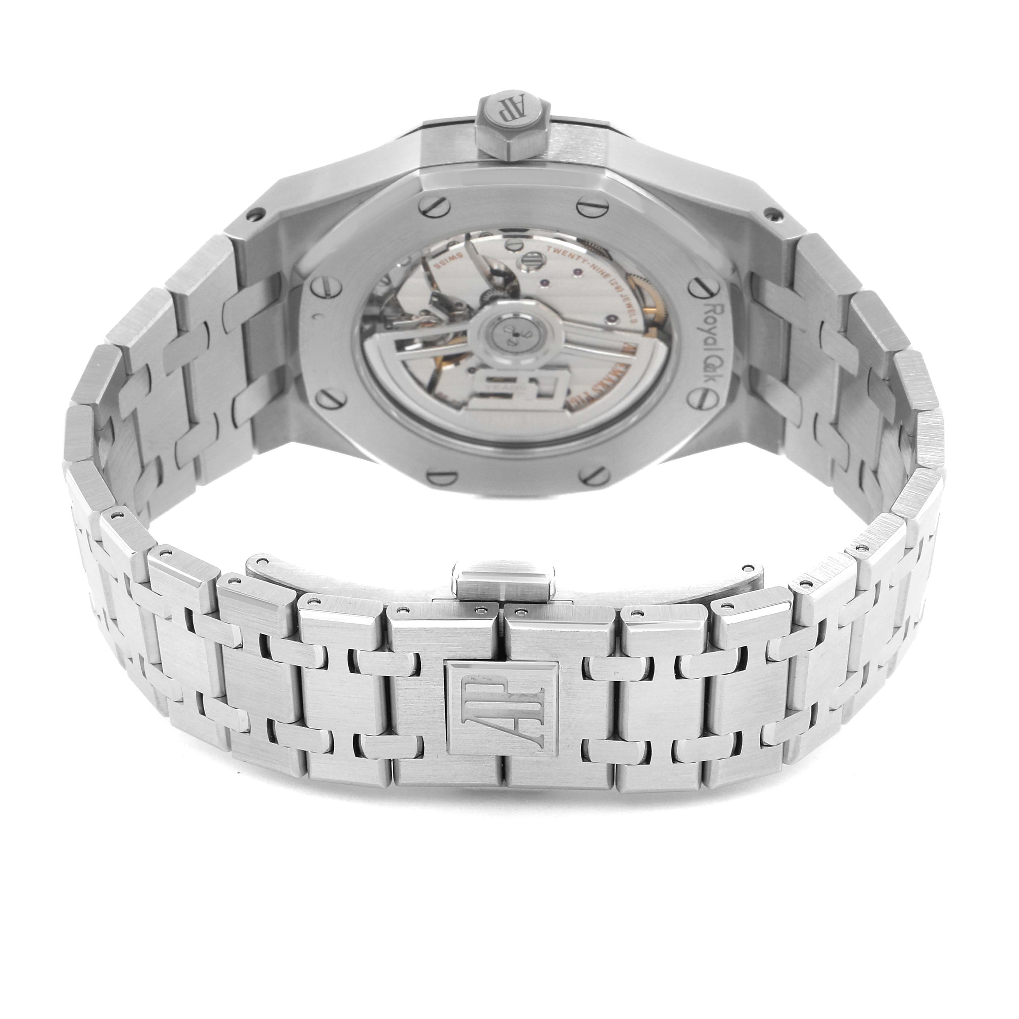 The image shows the back view of a Royal Oak by Audemars Piguet, highlighting the bracelet and open case back.