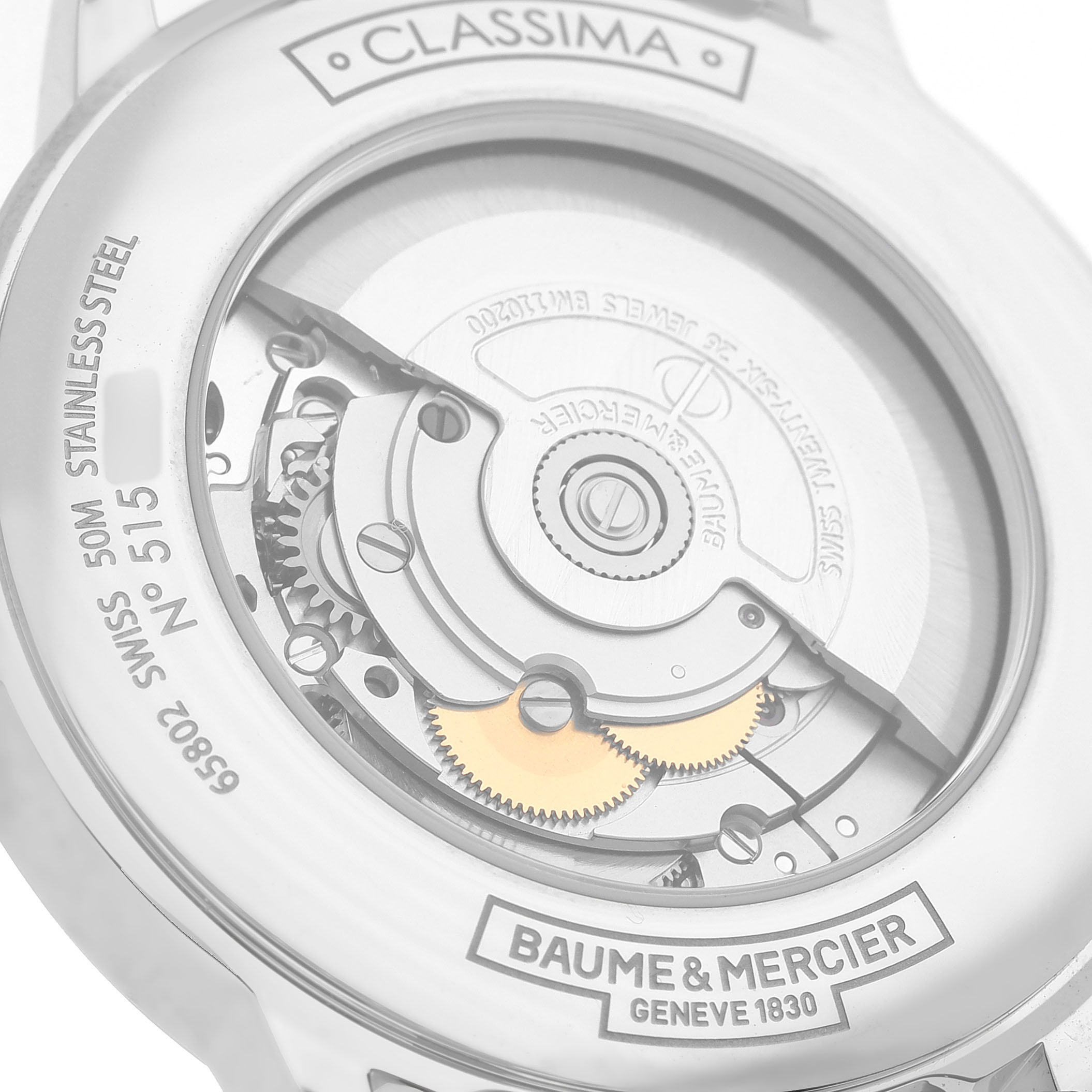 The image shows the back view of a Baume & Mercier Classima M0A10274 Men's Stainless Steel Silver Dial watch, highlighting the mechanical movement and gears.