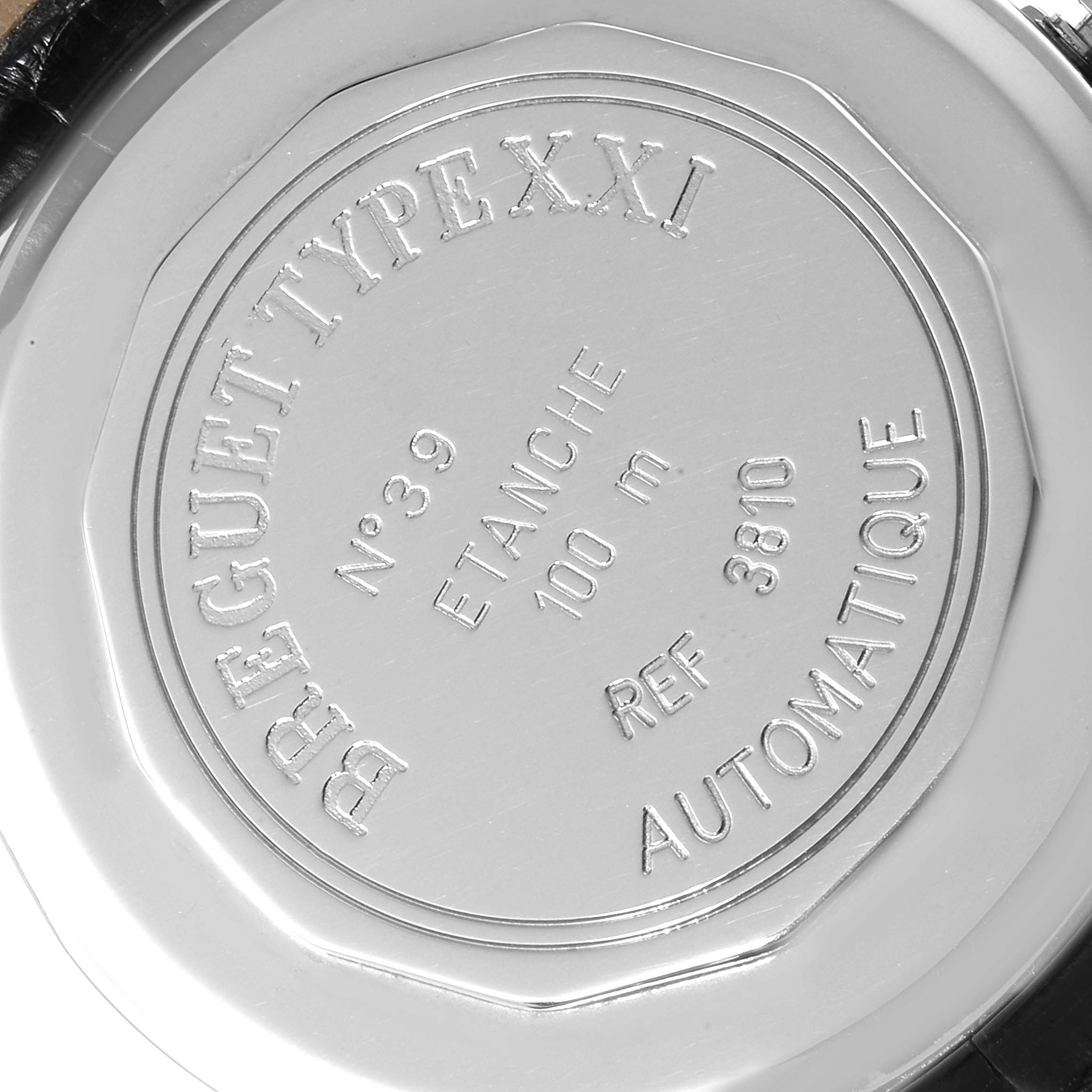 This image shows the engraved back of a Breguet Type XXI watch, highlighting its model information and water resistance.