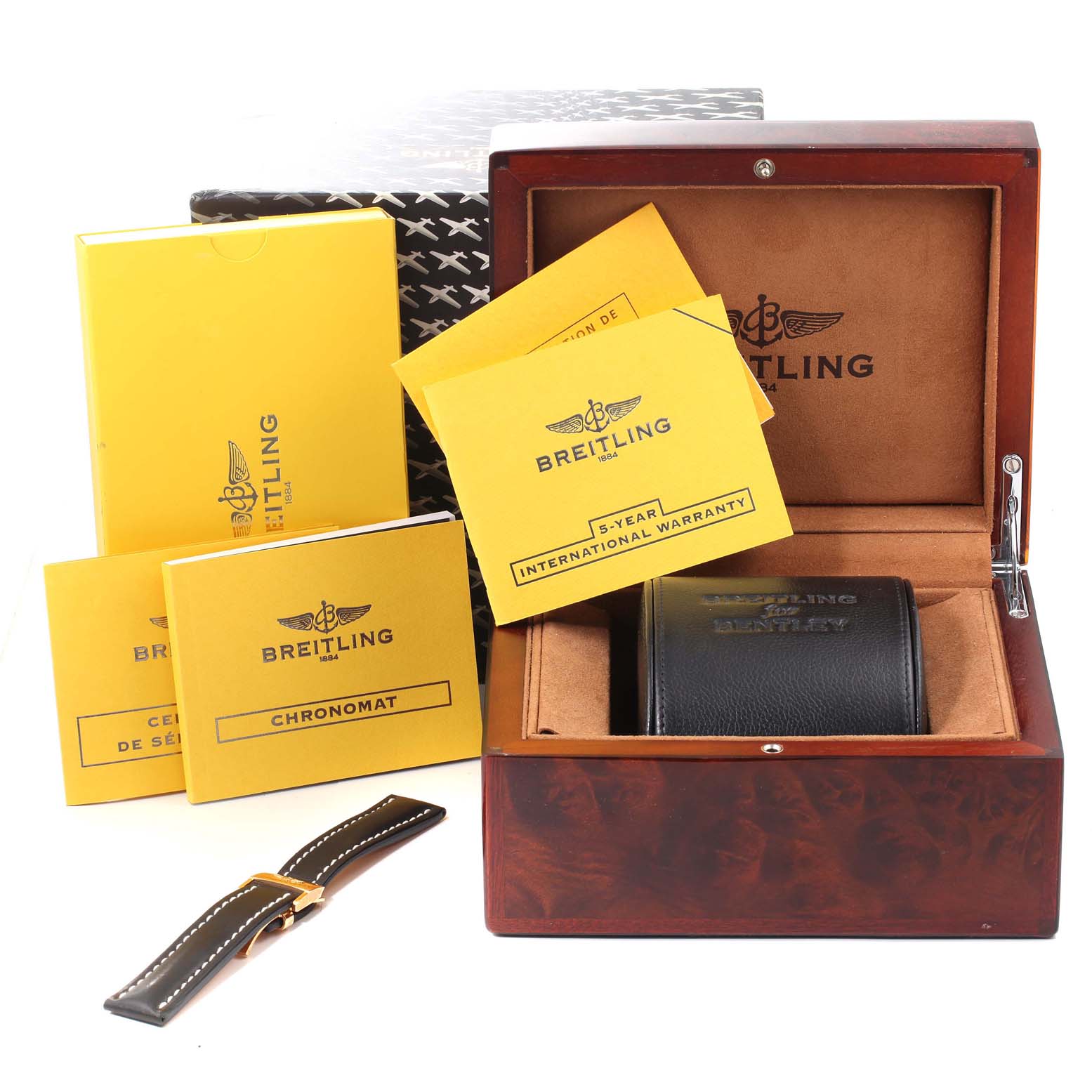 The image shows a Breitling Chronomat HB0110 Men's Rose Gold Blue Dial HB0110 Men's Rose Gold Blue Dial watch box, manuals, warranty card, and an extra strap, viewed from the front.