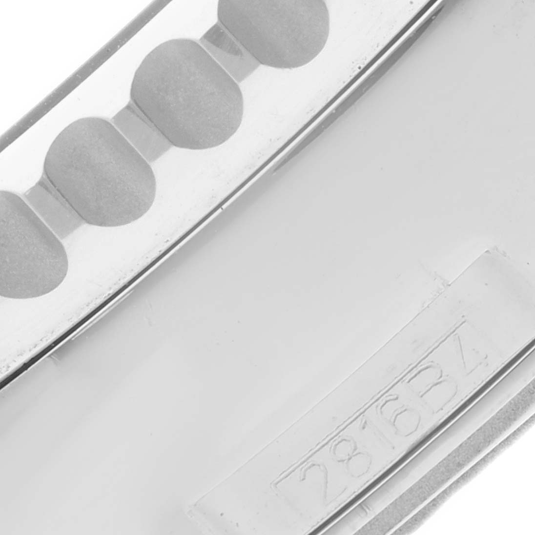 This image shows a close-up of the inner part of a Breitling Navitimer A2135024/BE62-453A Men's Stainless Steel Black Dial A2135024/BE62-453A Men's Stainless Steel Black Dial watch band or clasp with a partial serial number "2816BZ."