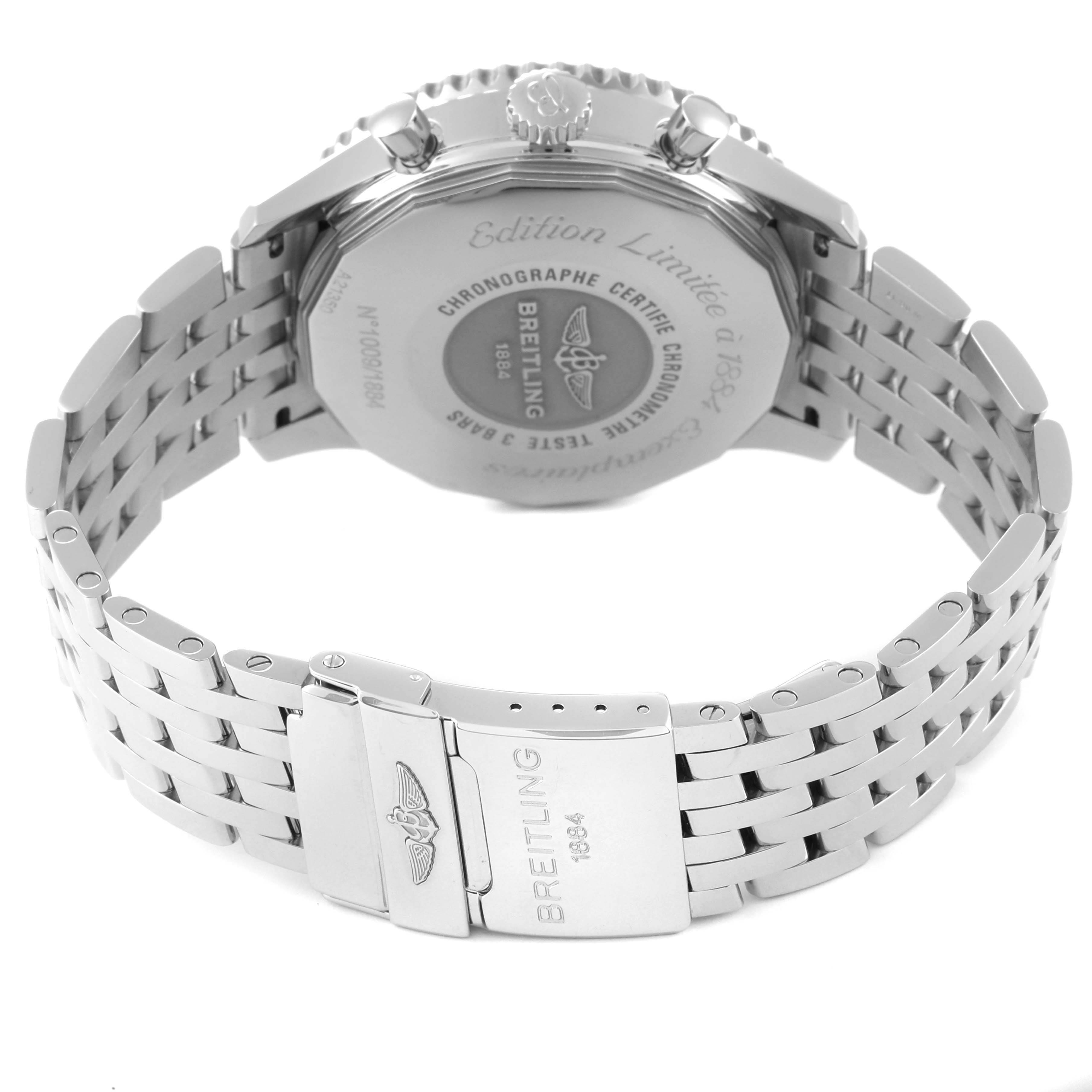 The image shows the backside and clasp of the Breitling Navitimer A2135024/BE62-453A Men's Stainless Steel Black Dial A2135024/BE62-453A Men's Stainless Steel Black Dial watch, highlighting the engraved case back and stainless steel bracelet.