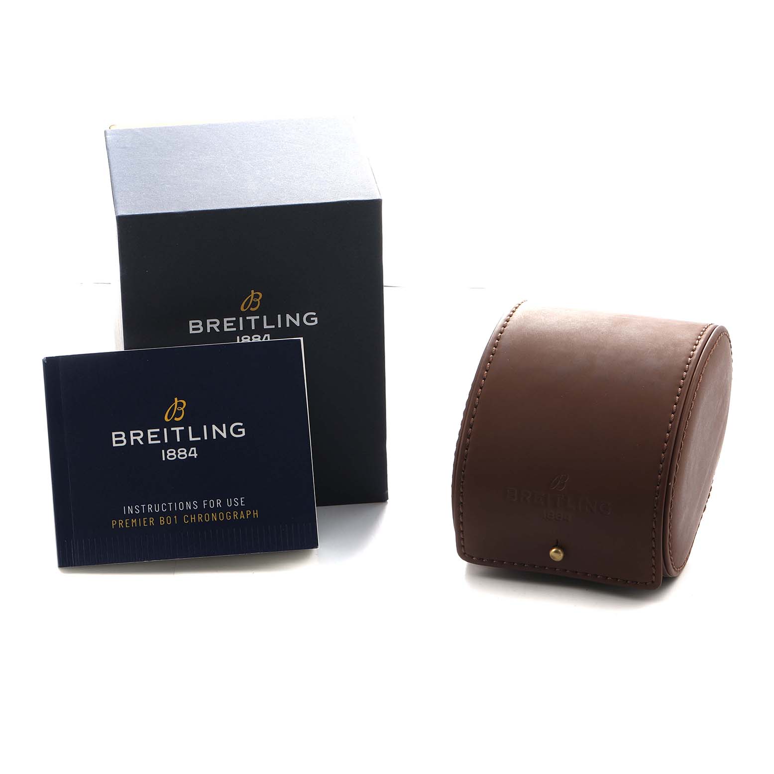 The image shows the packaging for the Breitling Premier AB0118 Men's Stainless Steel Black Dial model, including a box, instruction booklet, and leather case.