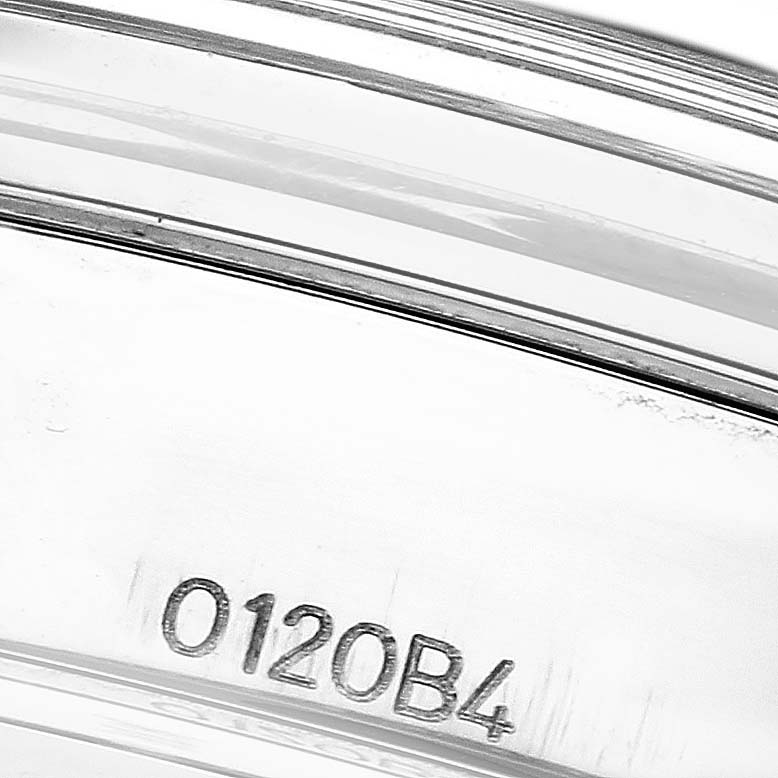 The image shows a close-up of the side of the Breitling Premier AB0118 Men's Stainless Steel Black Dial model watch with a focus on engraved numbers.