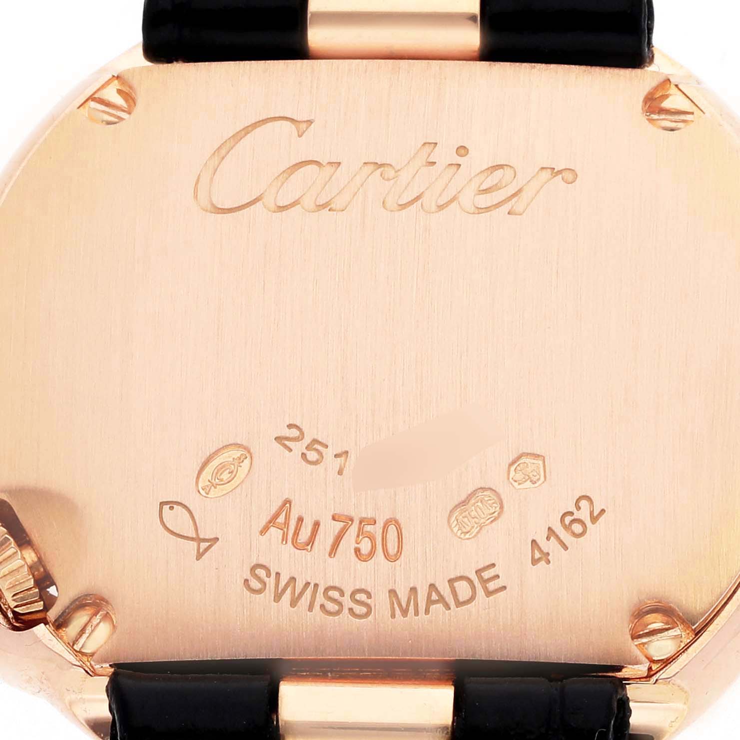 The image shows the back of the Ballon Blanc de Cartier watch, highlighting engraving details and part of the strap attachment.