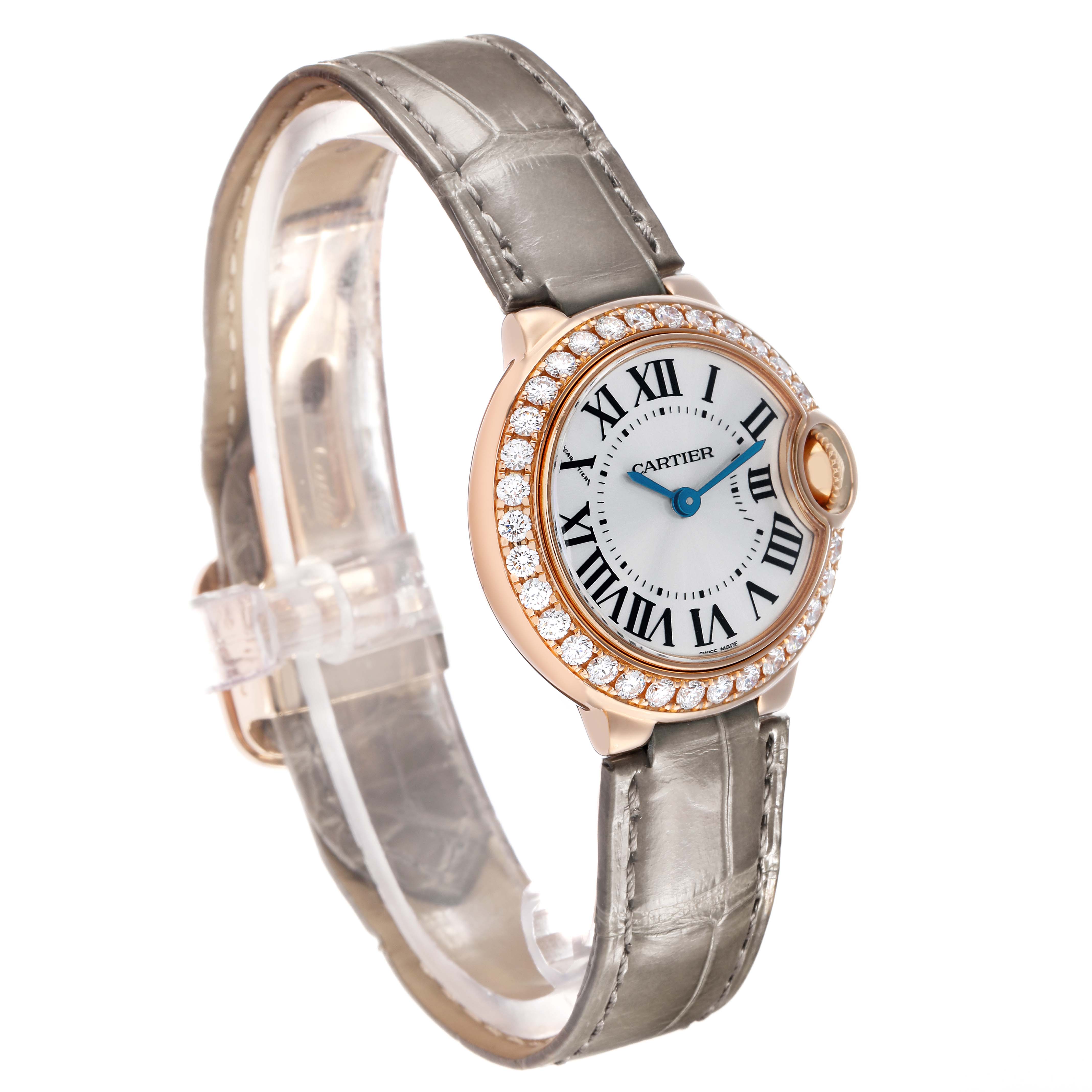 The Cartier Ballon Bleu WE900251 Women's Rose Gold Silver Dial watch is shown at a slight angle highlighting its face, diamond bezel, and part of the strap.