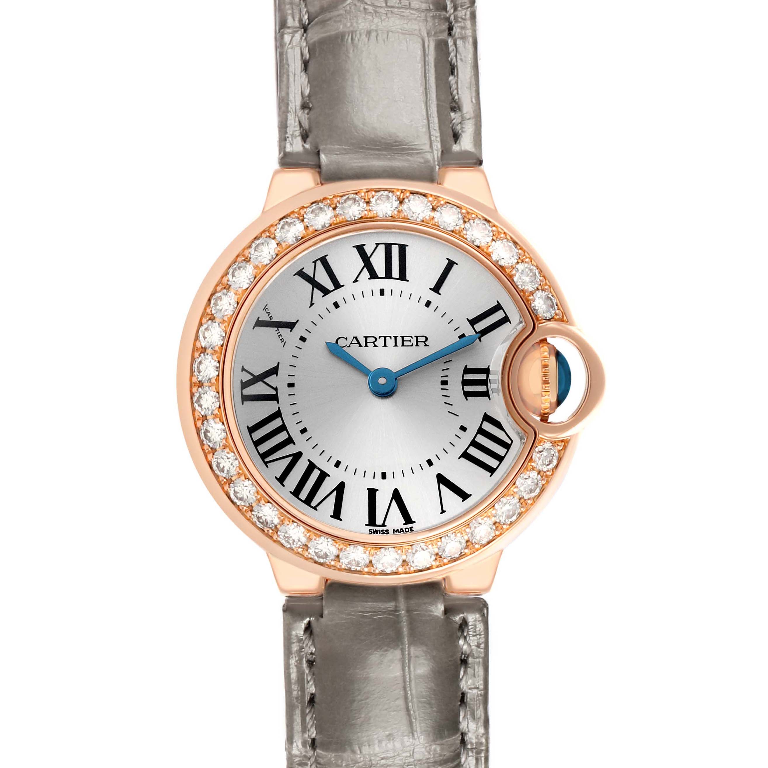 The Cartier Ballon Bleu WE900251 Women's Rose Gold Silver Dial watch is shown from a top-down angle, highlighting its round face, diamond-encrusted bezel, and leather strap.