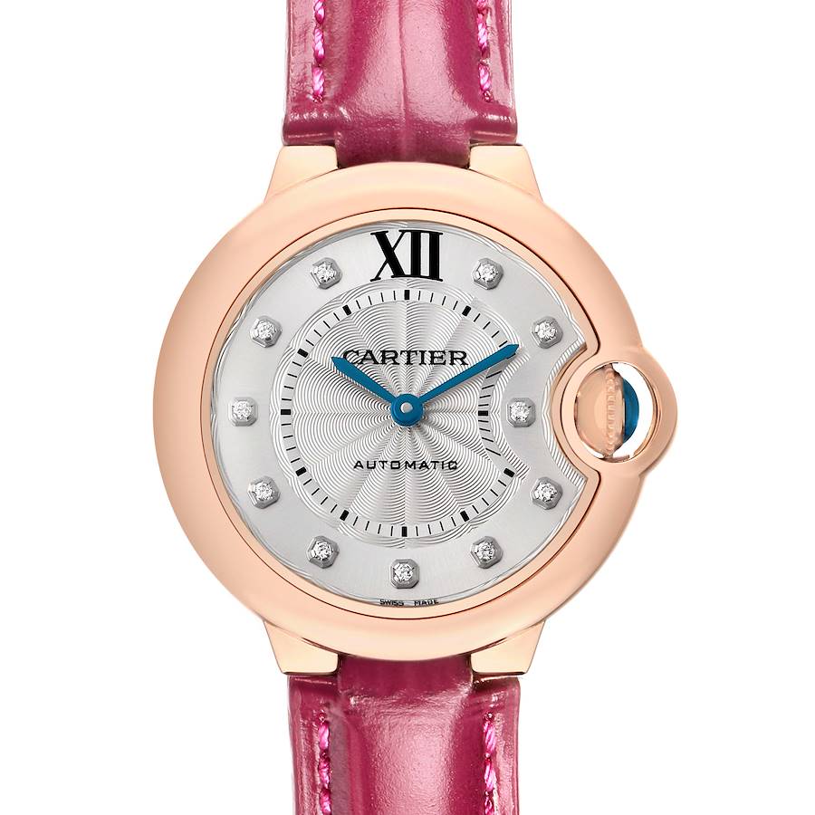 The Cartier Ballon Bleu WE902063 Women's Rose Gold Silver Dial watch is shown from a front angle, highlighting the dial, hands, and pink strap.