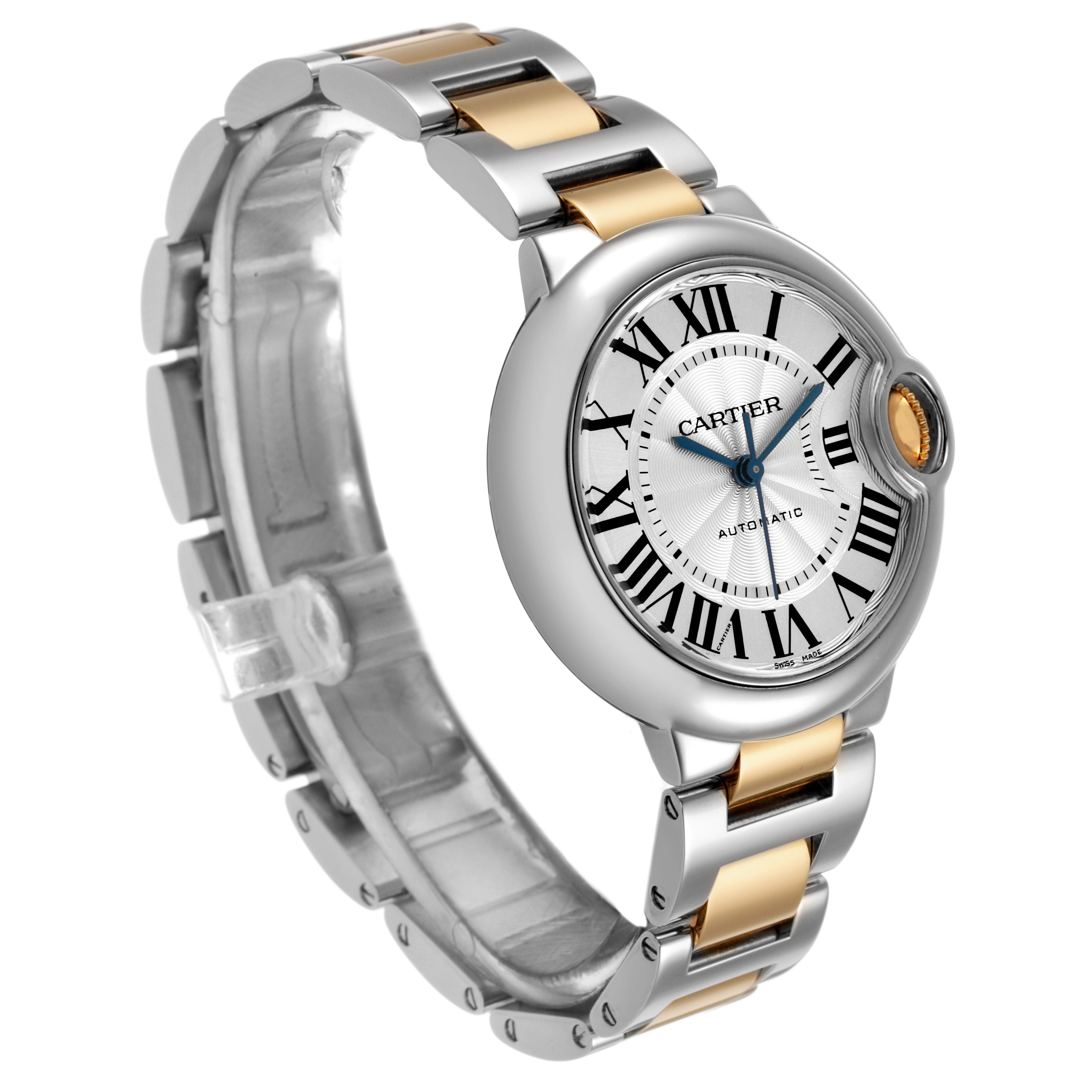 The Cartier Ballon Bleu W2BB0002 Women's Steel and Gold (two tone) Silver Dial watch is shown at a 3/4 angle, highlighting the face, Roman numerals, and two-tone bracelet.