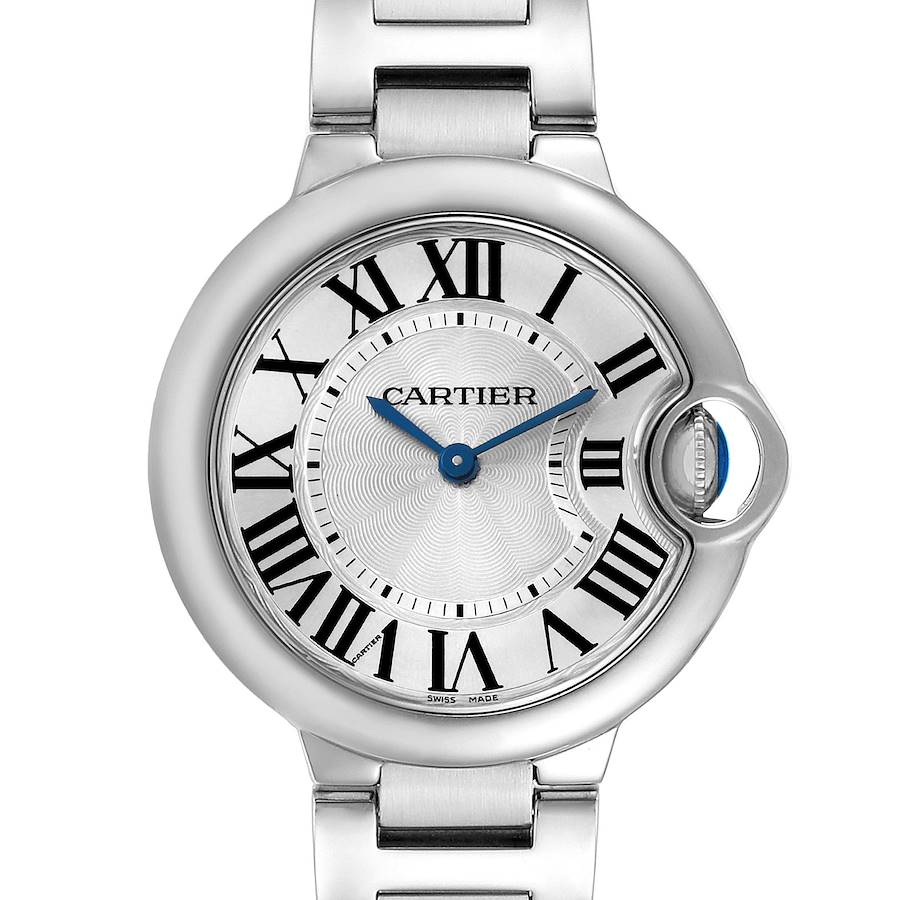 The Cartier Ballon Bleu watch is shown from a frontal angle, displaying the dial, Roman numerals, blue hands, and metal bracelet.