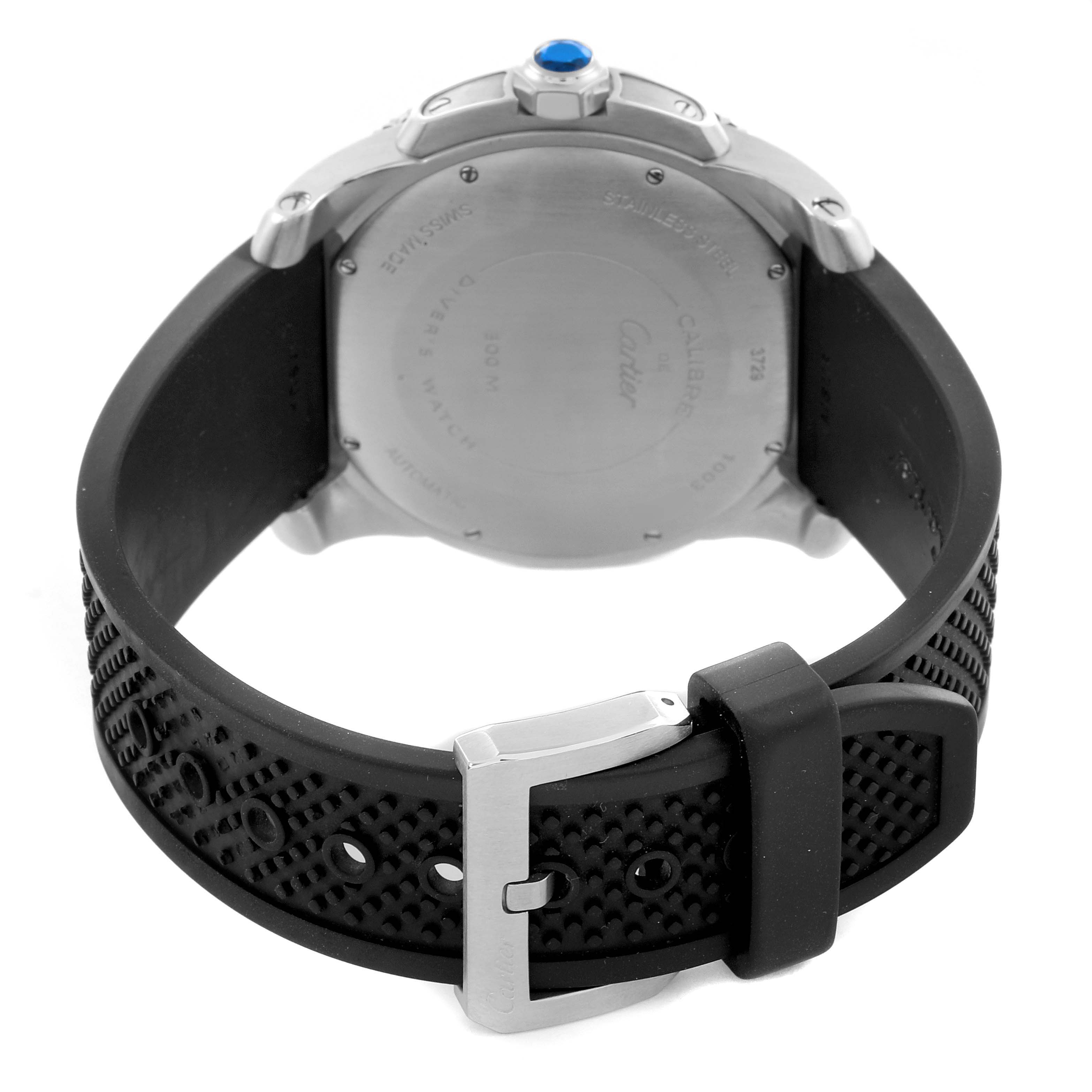 The image shows the back and side view of the Calibre de Cartier watch, highlighting the case, strap, and buckle.