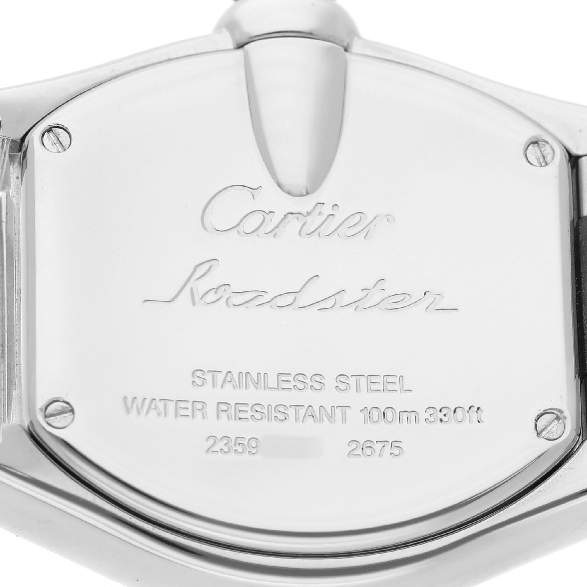 The image shows the back case of a Cartier Roadster W62016V3 Women's Stainless Steel Silver Dial watch, highlighting its stainless steel material and water resistance details.