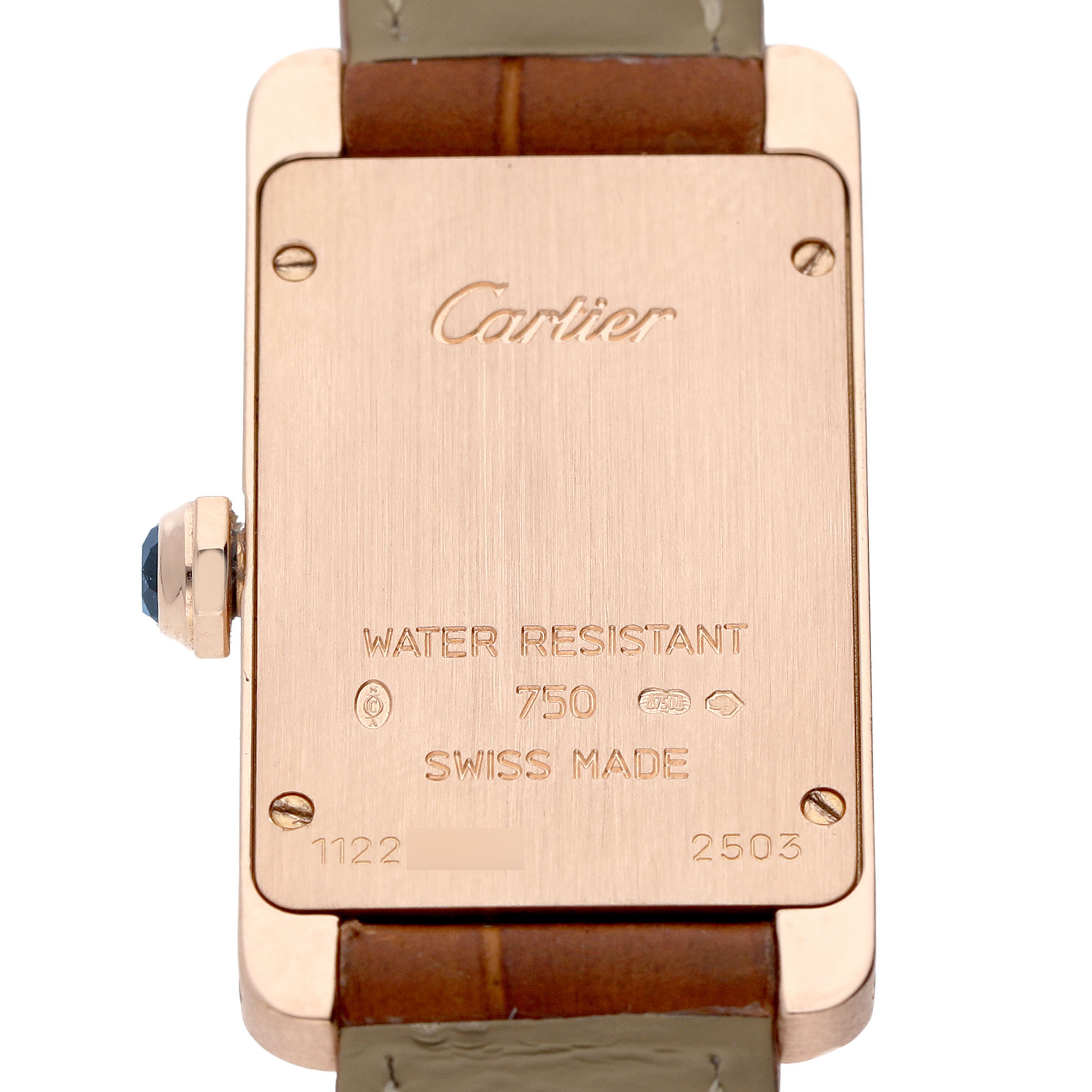 The image shows the back of the Cartier Tank Americaine W2607456 Women's Rose Gold Silver Dial watch, displaying its engraving and crown.