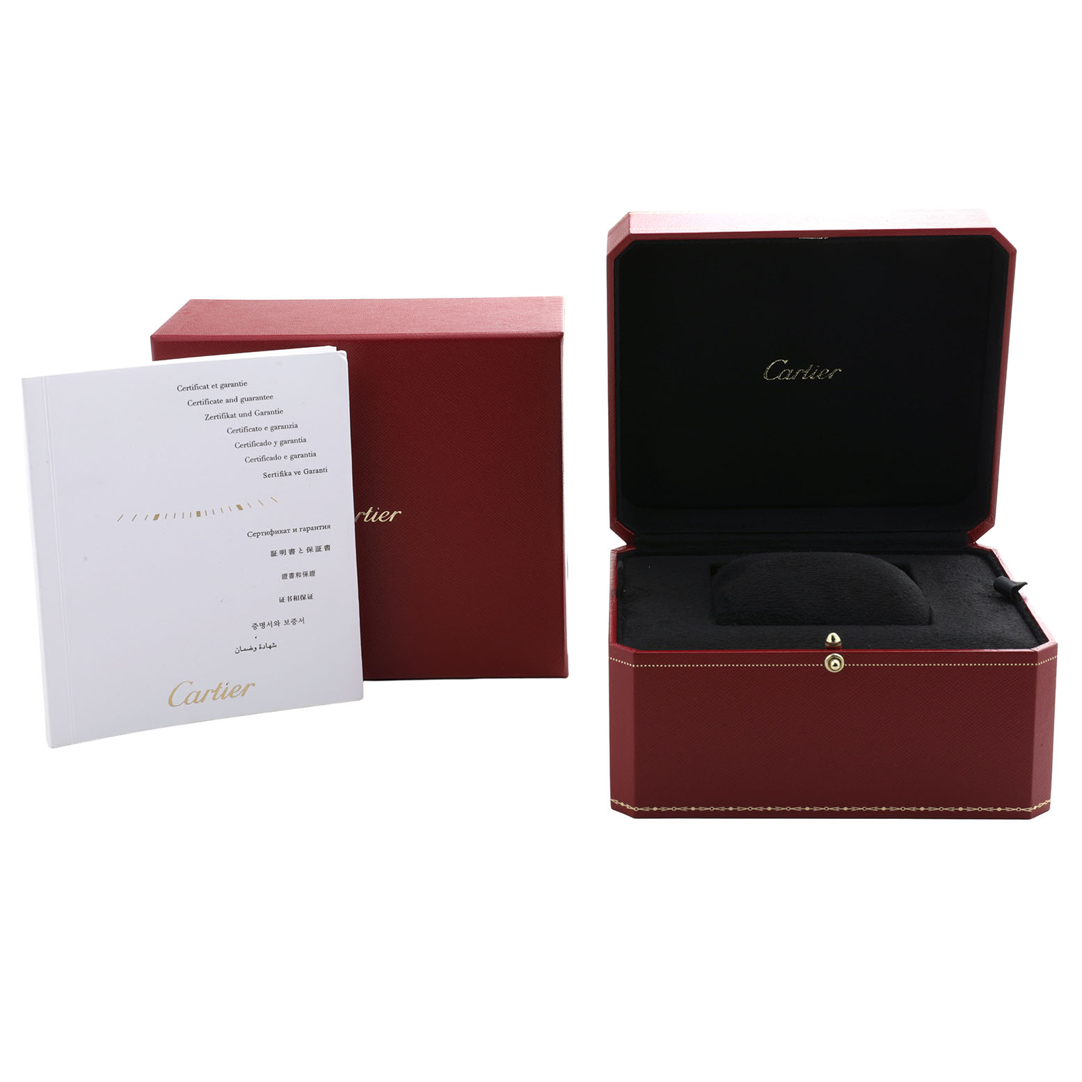 The image shows an open Cartier watch box and a booklet, angled to display the accessories for the Tank Americaine model.