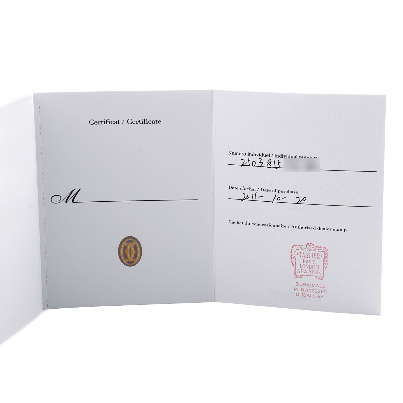 The image shows a certificate for a Cartier Tank Américaine watch from an open front angle.