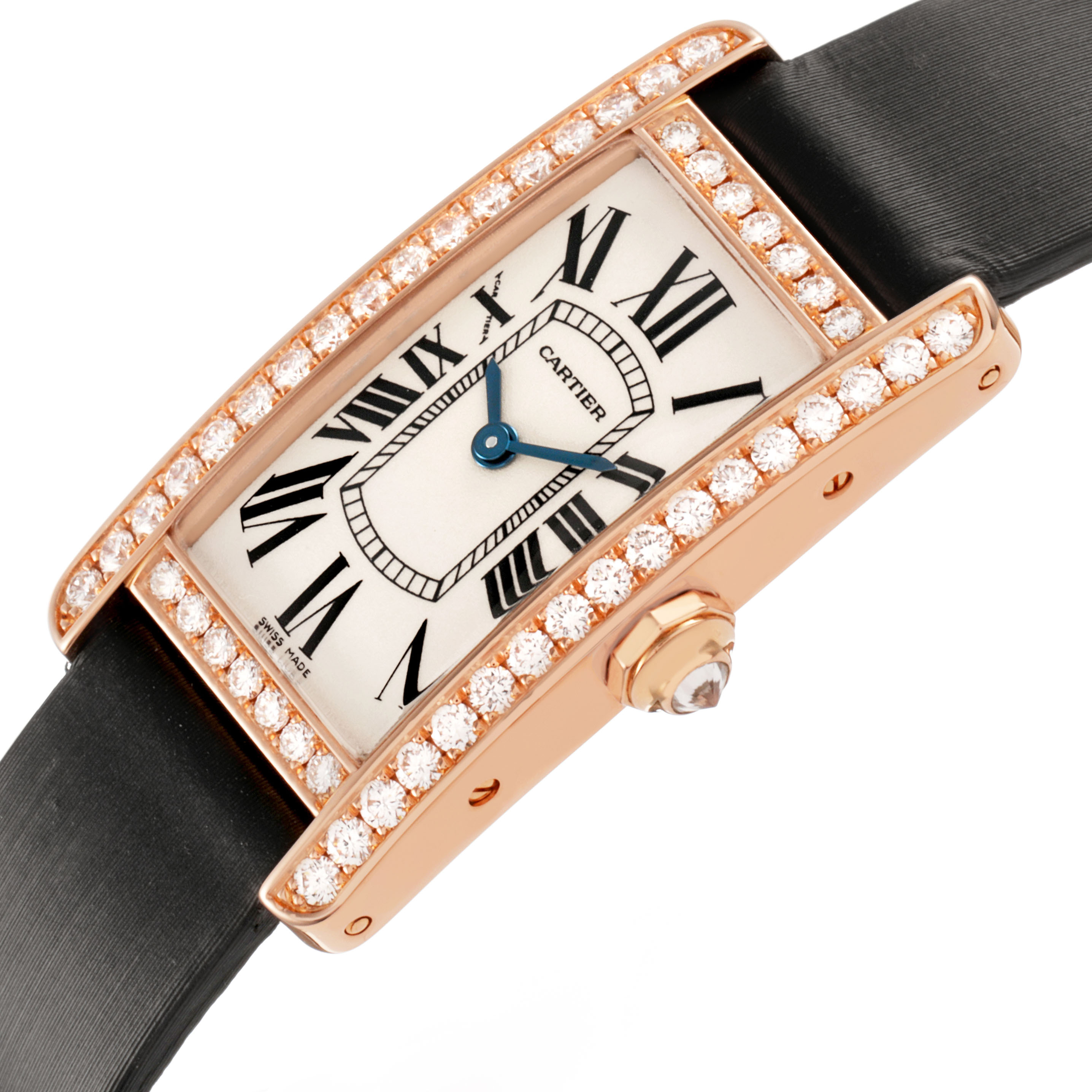 The Cartier Tank Americaine WJTA0002 Women's Rose Gold Silver Dial watch is shown at an angled top view, highlighting its diamond-encrusted bezel and side profile.