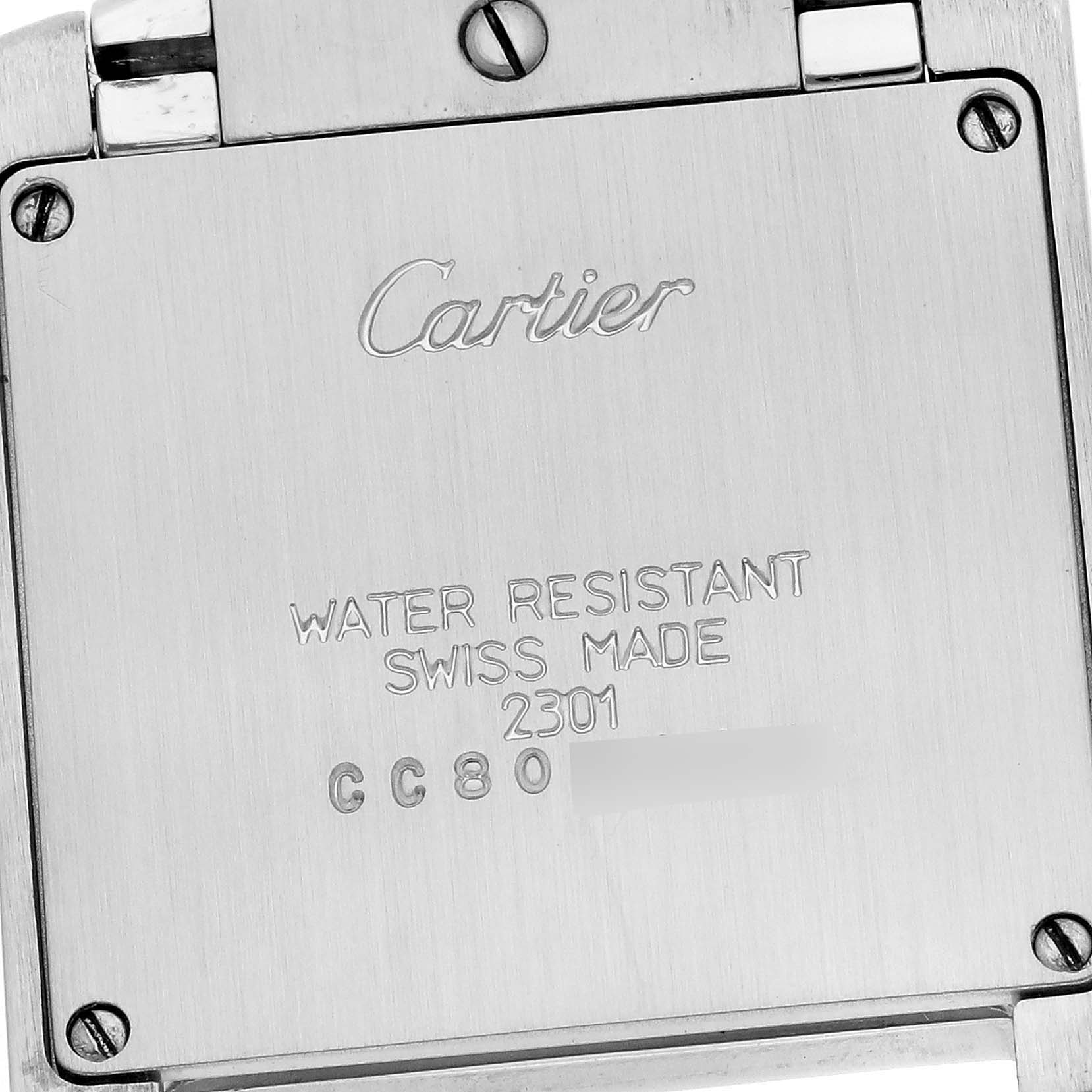 The image shows the back case of the Cartier Tank Française watch, displaying engraved details.