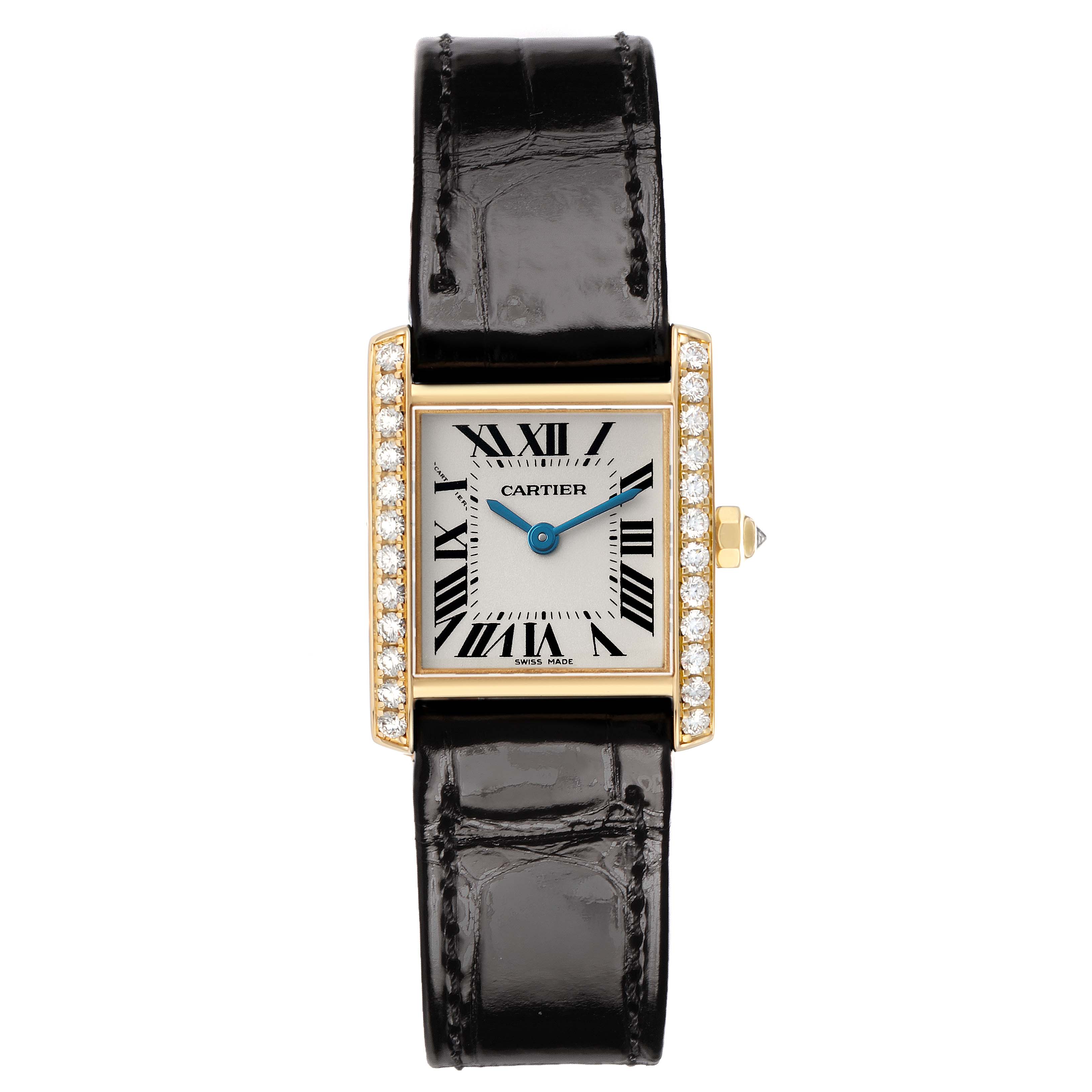 The Cartier Tank Francaise WE100151 Women's Yellow Gold Silver Dial watch is shown from the front, highlighting its rectangular face, Roman numerals, and leather strap.