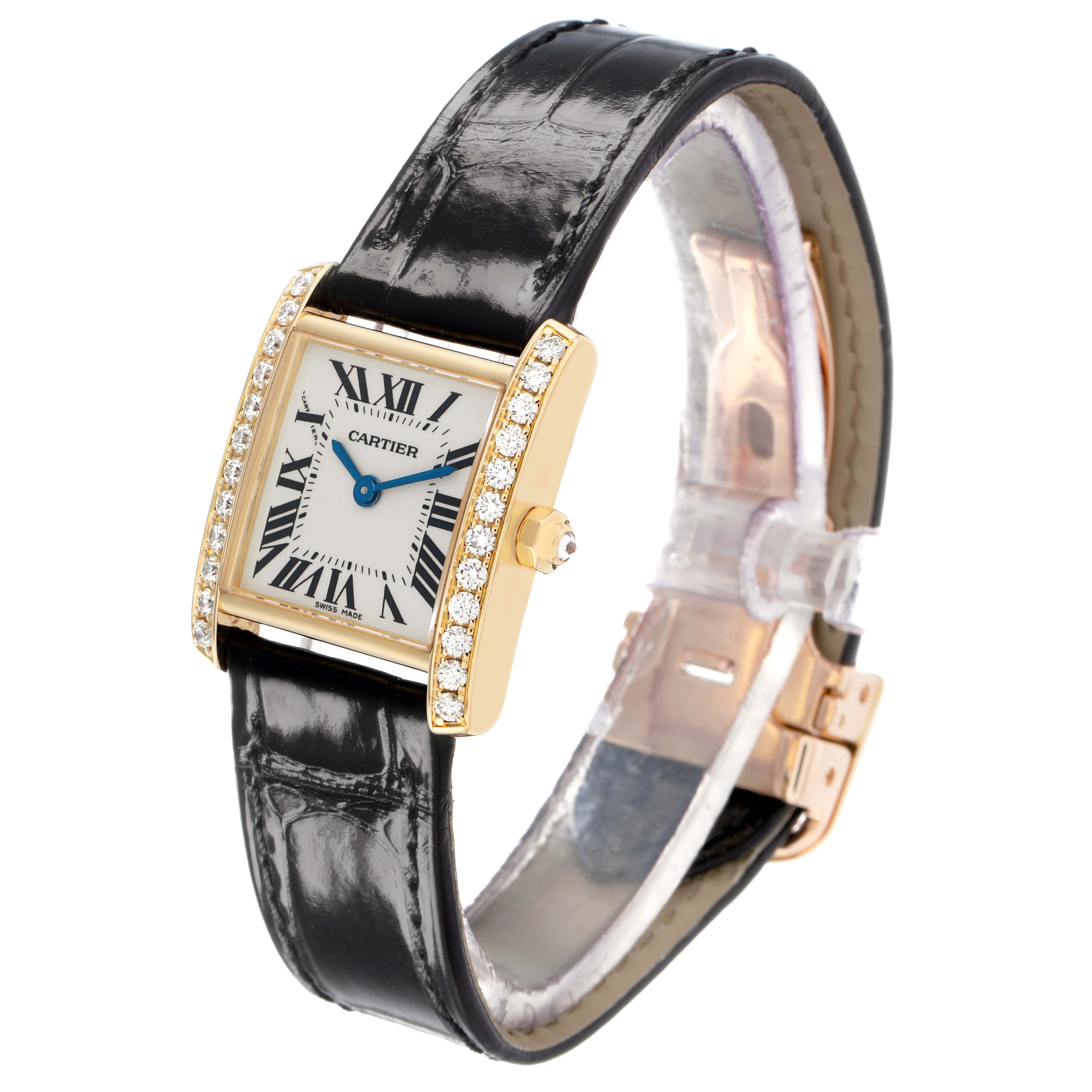 The Cartier Tank Francaise WE100151 Women's Yellow Gold Silver Dial watch is shown at an angled side view, displaying the face, crown, and part of the leather strap.
