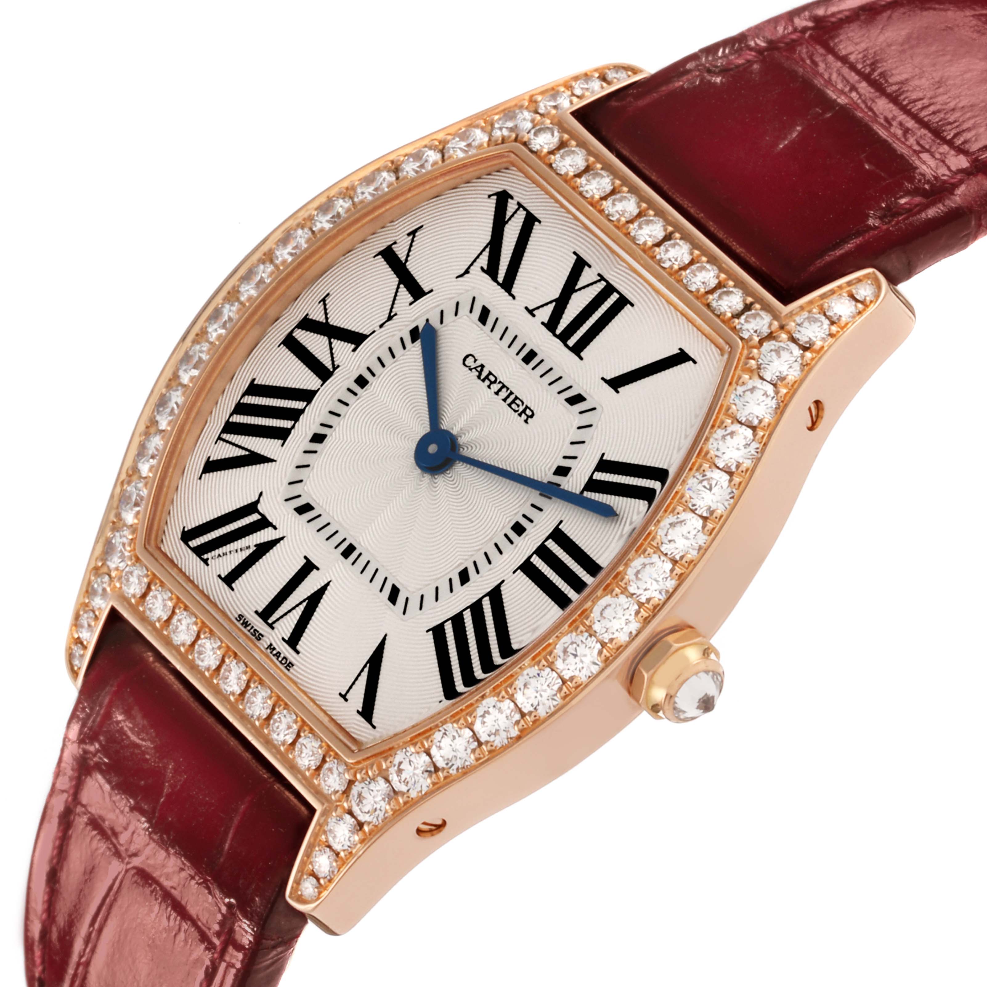The Cartier Tortue WA501008 Women's Rose Gold Silver Dial WA501008 Women's Rose Gold Silver Dial watch is shown at a slight angle, highlighting the diamond bezel, dial with Roman numerals, and leather strap.