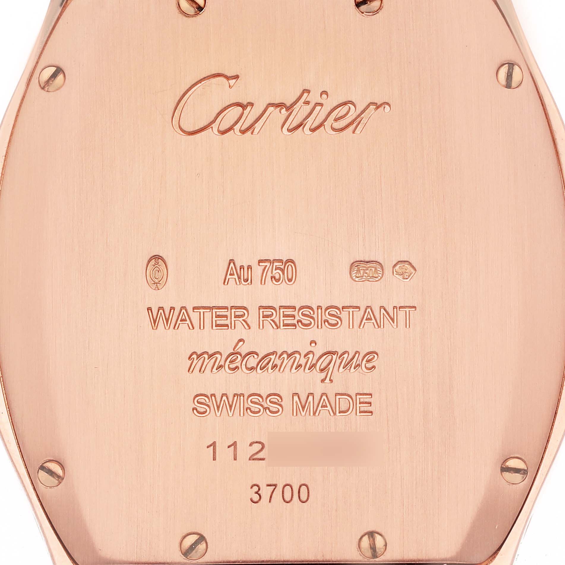 The image shows the back casing of the Cartier Tortue WA501008 Women's Rose Gold Silver Dial WA501008 Women's Rose Gold Silver Dial watch with engraved details.