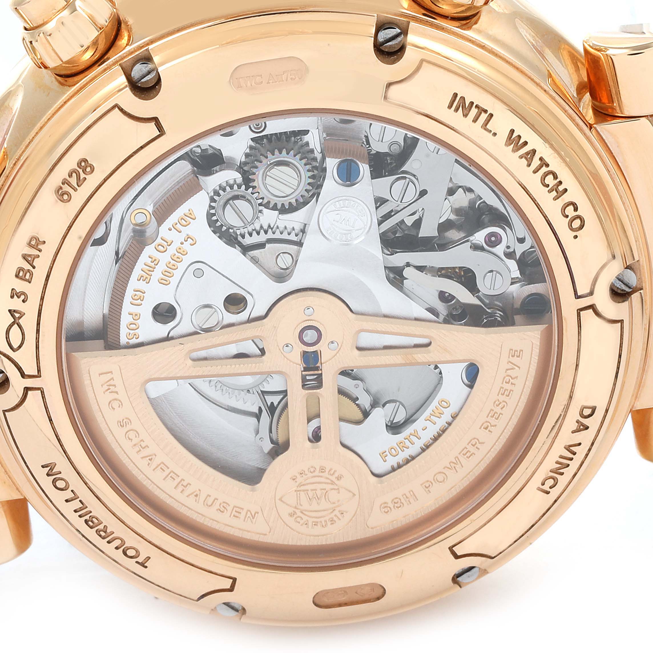 The image shows the back view of an IWC Da Vinci IW393101 Men's Rose Gold Silver Dial IW393101 Men's Rose Gold Silver Dial watch, revealing its intricate mechanical movement.